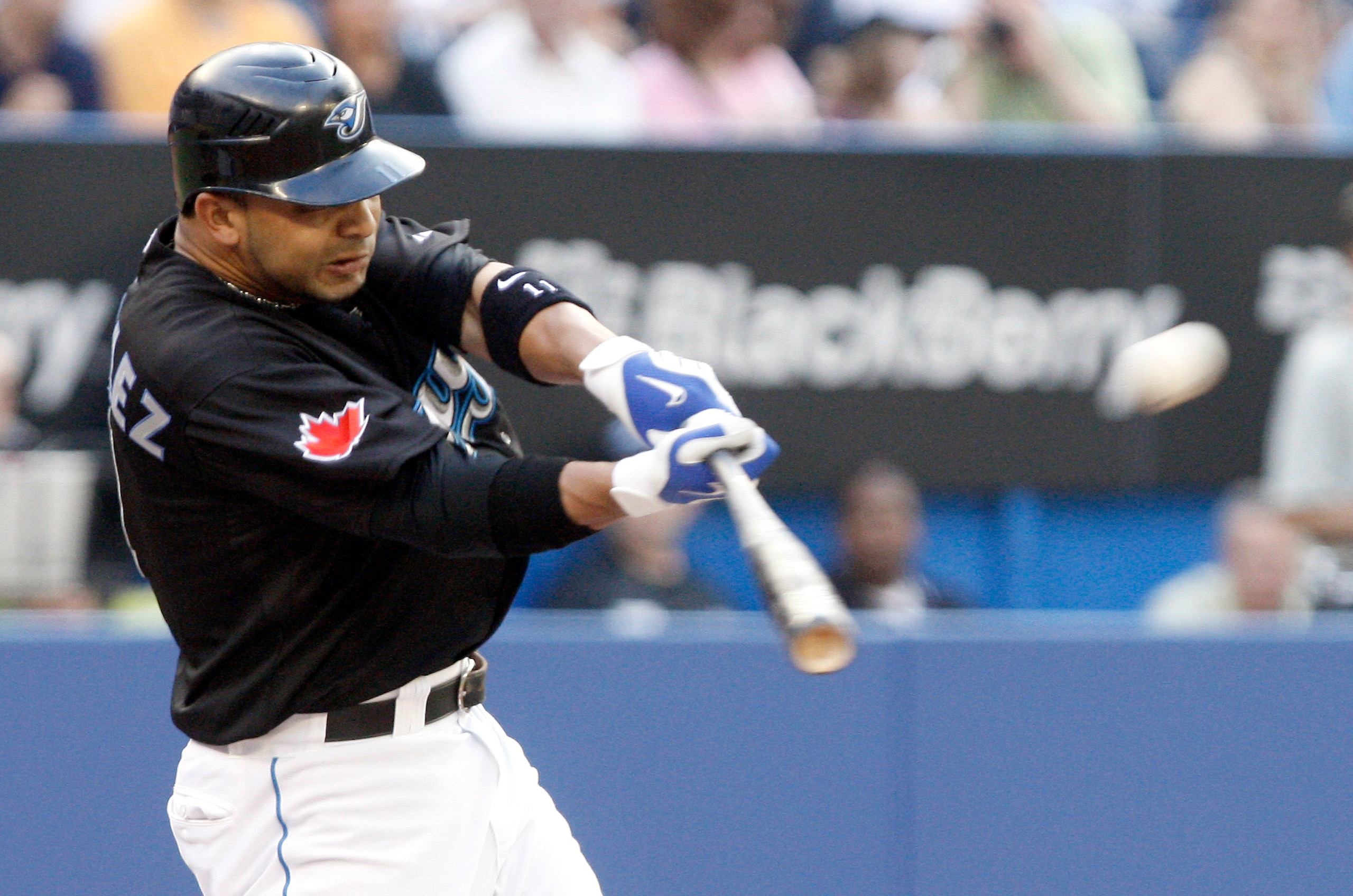 TORONTO - JULY 8: Alex Gonzalez #11 of the Toronto Blue Jays hits a three run double against the Minnesota Twins during a MLB game at The Rogers Centre July 8, 2010 in Toronto, Ontario, Canada. (Photo by Abelimages/Getty Images)