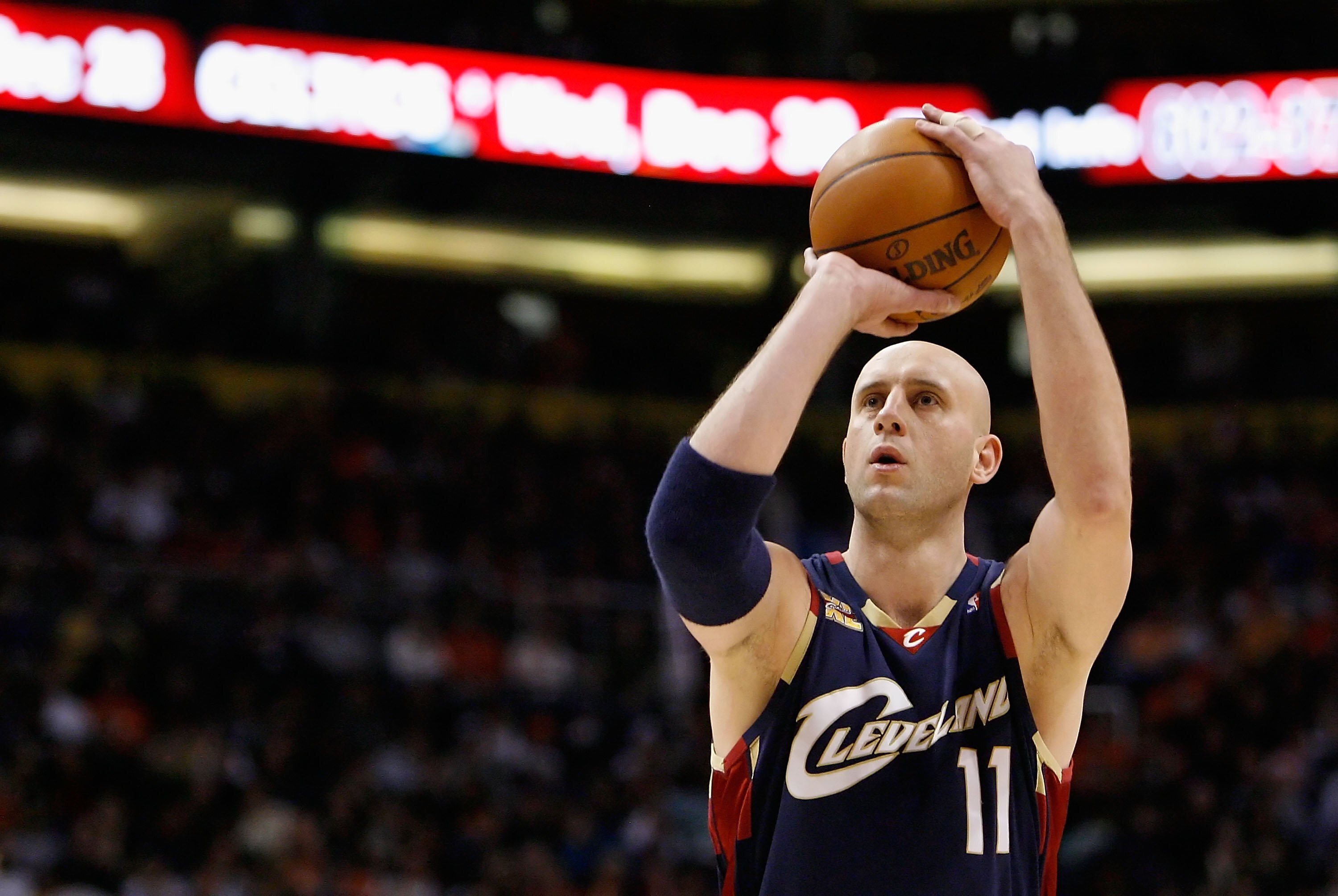 PHOENIX - DECEMBER 21:  Zydrunas Ilgauskas #11 of the Cleveland Cavaliers shoots a free throw shot during the NBA game against of the Phoenix Suns at US Airways Center on December 21, 2009 in Phoenix, Arizona. The Cavaliers defeated the Suns 109-91.  NOTE