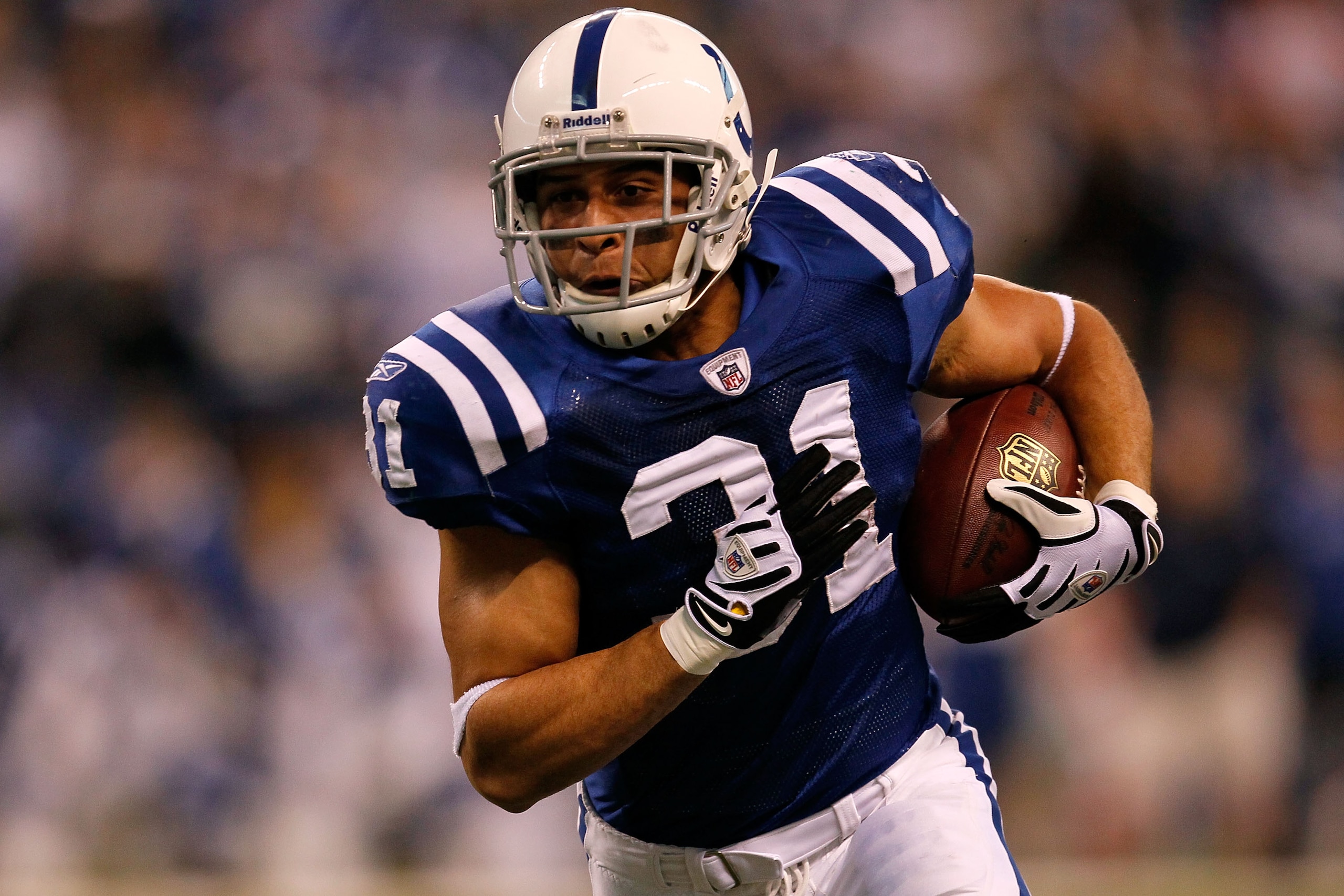 INDIANAPOLIS - JANUARY 24:  Running back Donald Brown #31 of the Indianapolis Colts runs the ball against the New York Jets during the first half of  the AFC Championship Game at Lucas Oil Stadium on January 24, 2010 in Indianapolis, Indiana.  (Photo by J