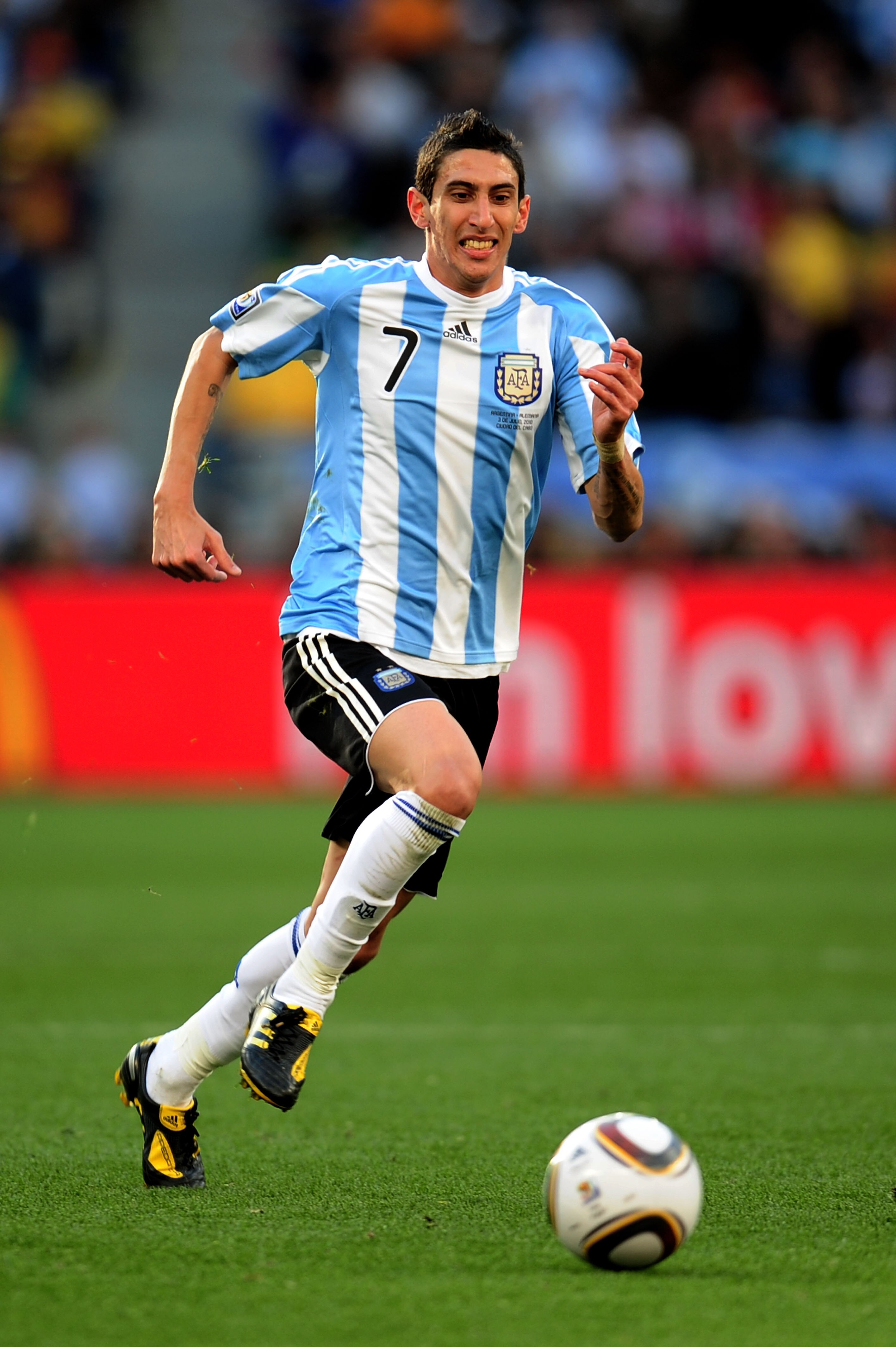 CAPE TOWN, SOUTH AFRICA - JULY 03:  Angel Di Maria of Argentina in action during the 2010 FIFA World Cup South Africa Quarter Final match between Argentina and Germany at Green Point Stadium on July 3, 2010 in Cape Town, South Africa.  (Photo by Clive Mas