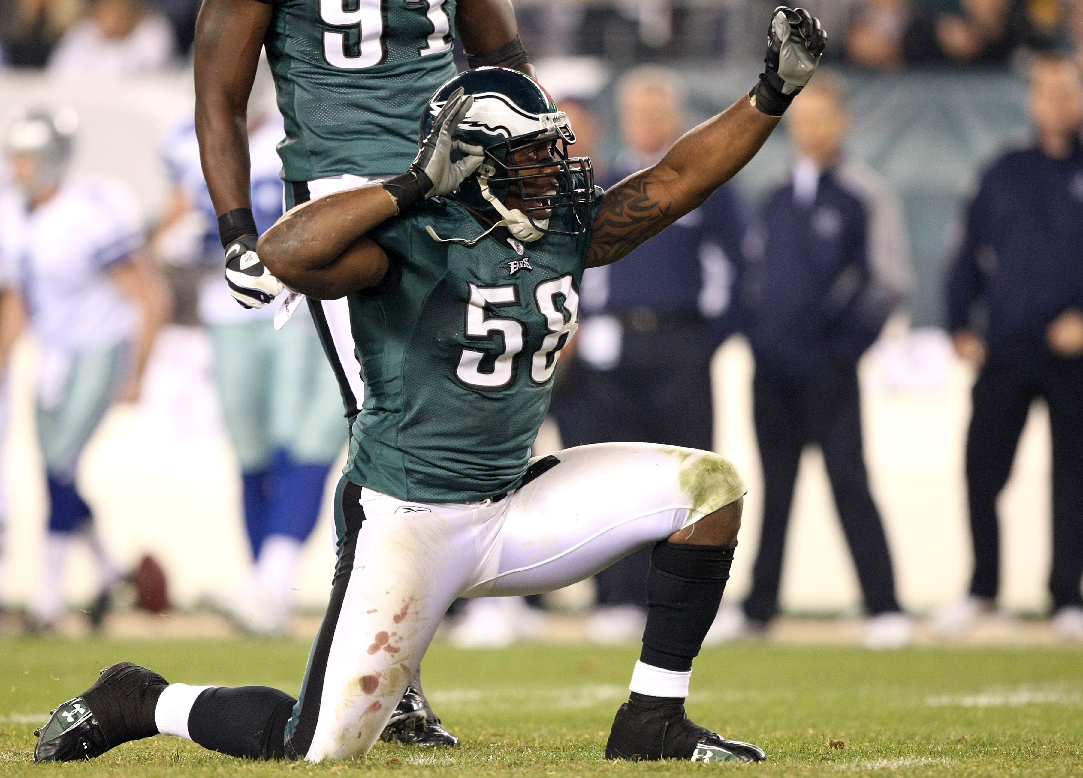 PHILADELPHIA - NOVEMBER 08:  Trent Cole #58 of the Philadelphia Eagles celebrates after he sacked Tony Romo #9 of the Dallas Cowboys in the third quarter at Lincoln Financial Field on November 8, 2009 in Philadelphia, Pennsylvania.  (Photo by Al Bello/Get