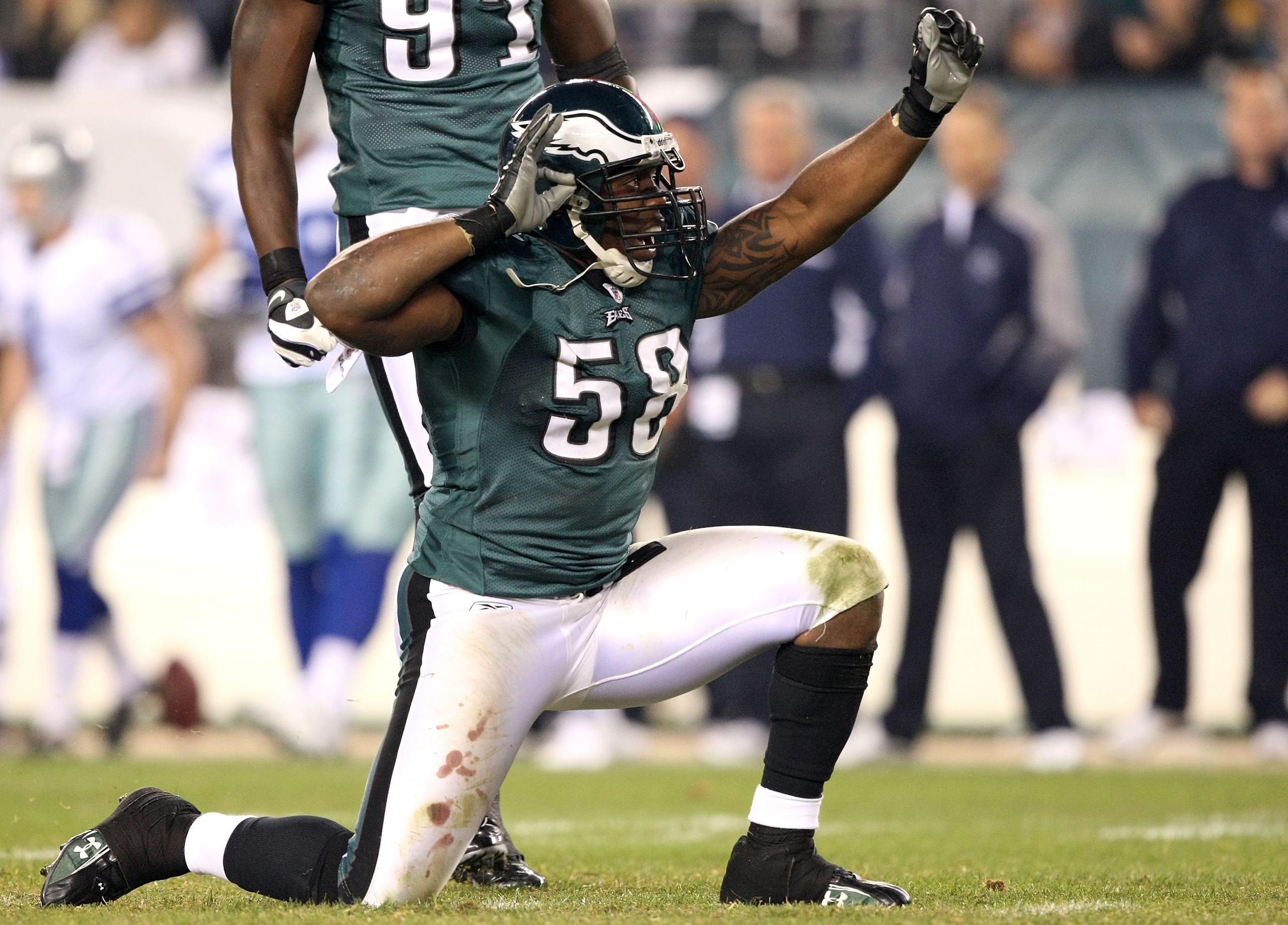 PHILADELPHIA - NOVEMBER 08:  Trent Cole #58 of the Philadelphia Eagles celebrates after he sacked Tony Romo #9 of the Dallas Cowboys in the third quarter at Lincoln Financial Field on November 8, 2009 in Philadelphia, Pennsylvania.  (Photo by Al Bello/Get