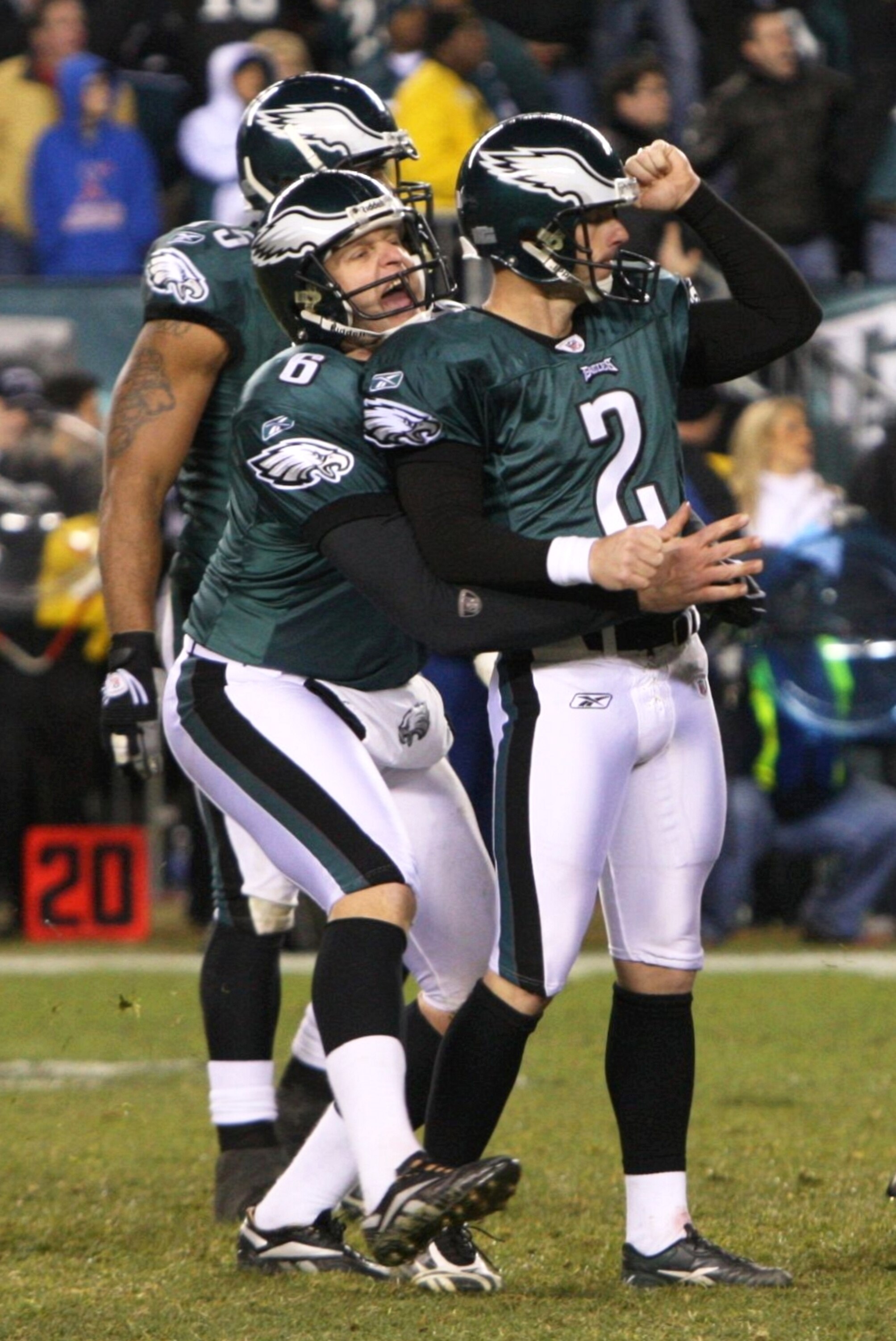PHILADELPHIA - DECEMBER 27 : David Akers #2 of the Philadelphia Eagles gets lifted by teammate Sav Rocca #6 after kicking the game winning field goal against the Denver Broncos at Lincoln Financial Field on December 27, 2009 in Philadelphia, Pennsylvania.