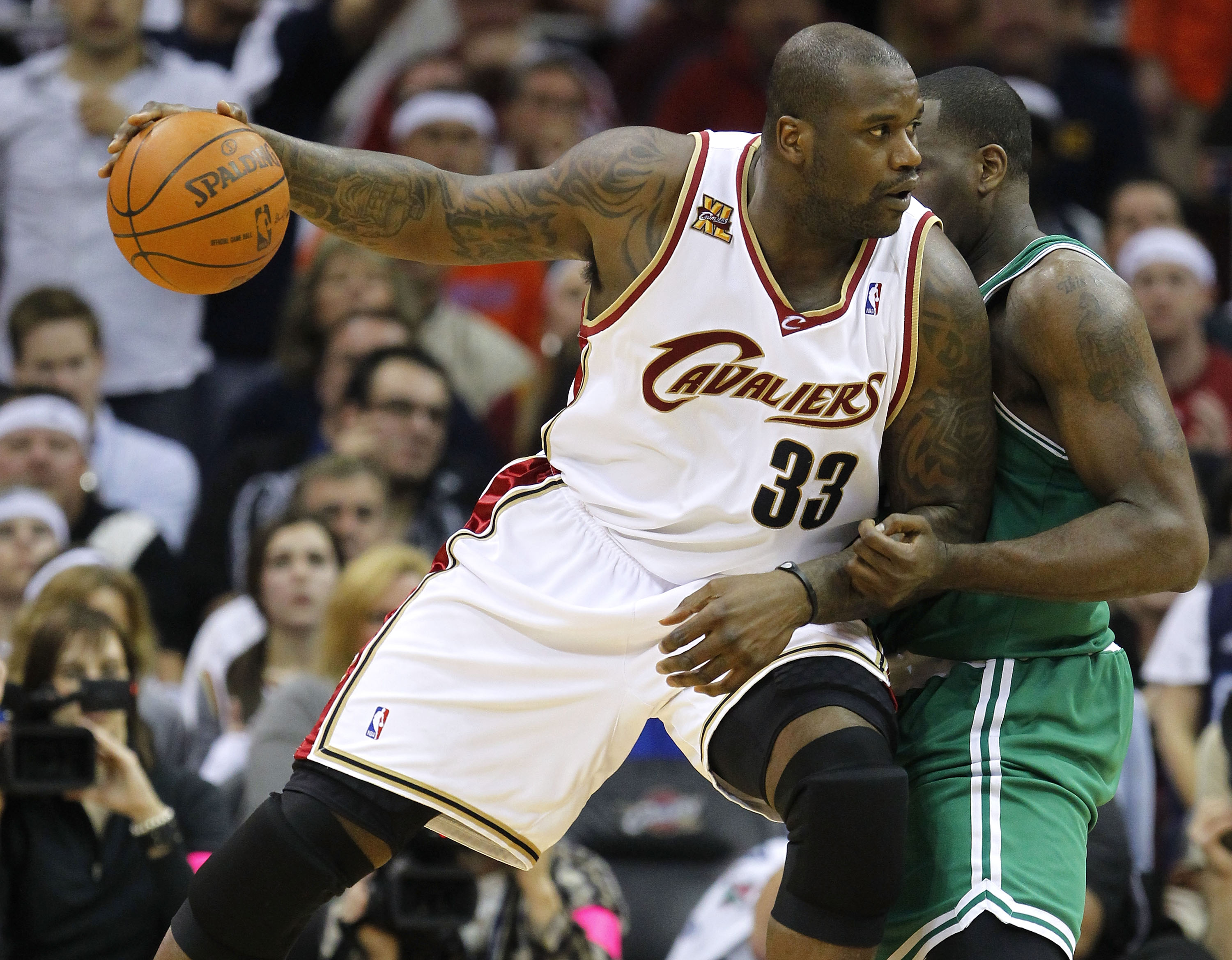 CLEVELAND - MAY 11: Shaquille O'Neal #33 of the Cleveland Cavaliers tries to get around the defense of Kendrick Perkins #43 of the  Boston Celtics in Game Five of the Eastern Conference Semifinals during the 2010 NBA Playoffs at Quicken Loans Arena on May