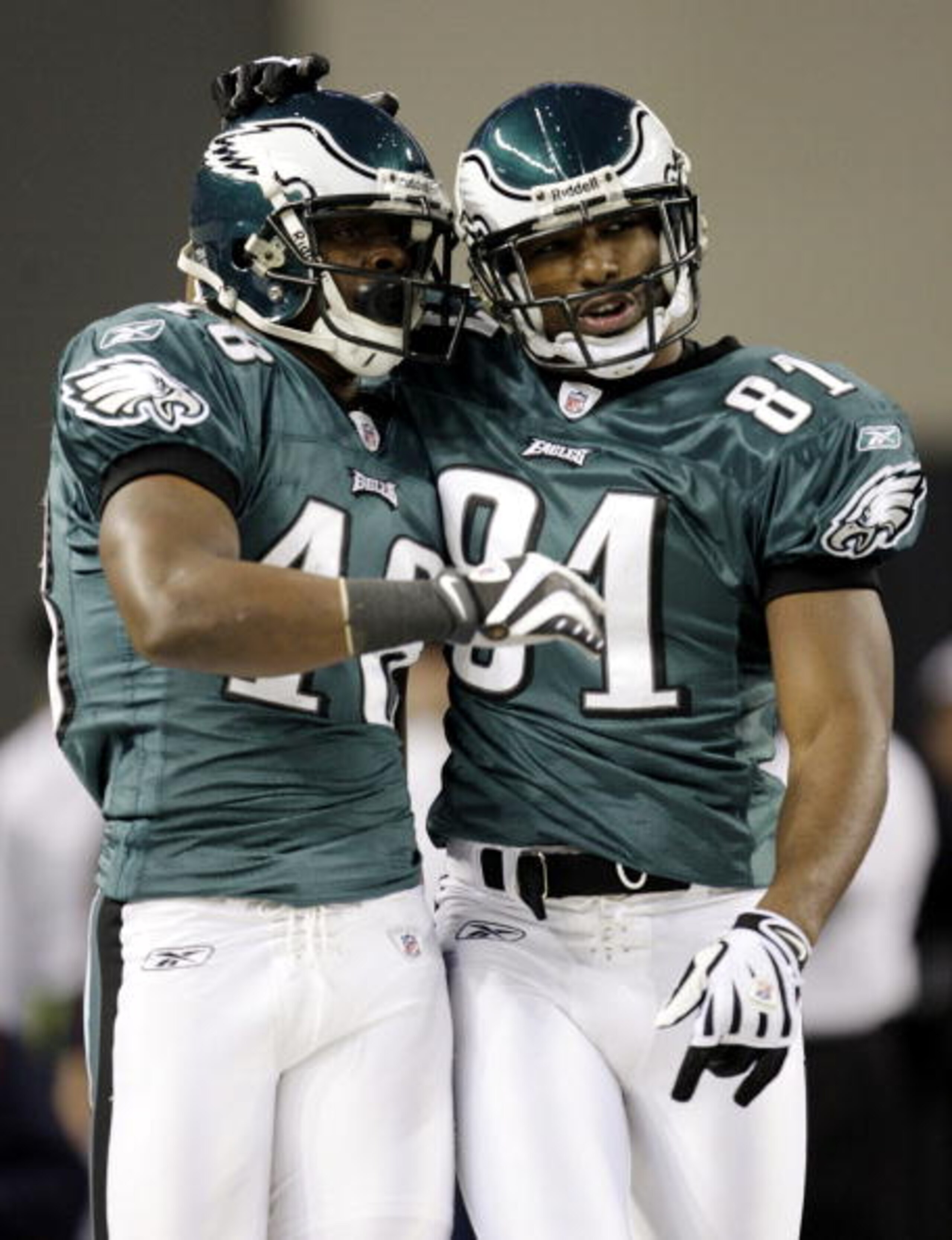 ARLINGTON, TX - JANUARY 9:  Jeremy Maclin #18 and  Jason Avant #81 of the Philadelphia Eagles celebrate Maclin's 76-yard second quarter touchdown catch against the Dallas Cowboys during the 2010 NFC wild-card playoff game at Cowboys Stadium on January 9, 