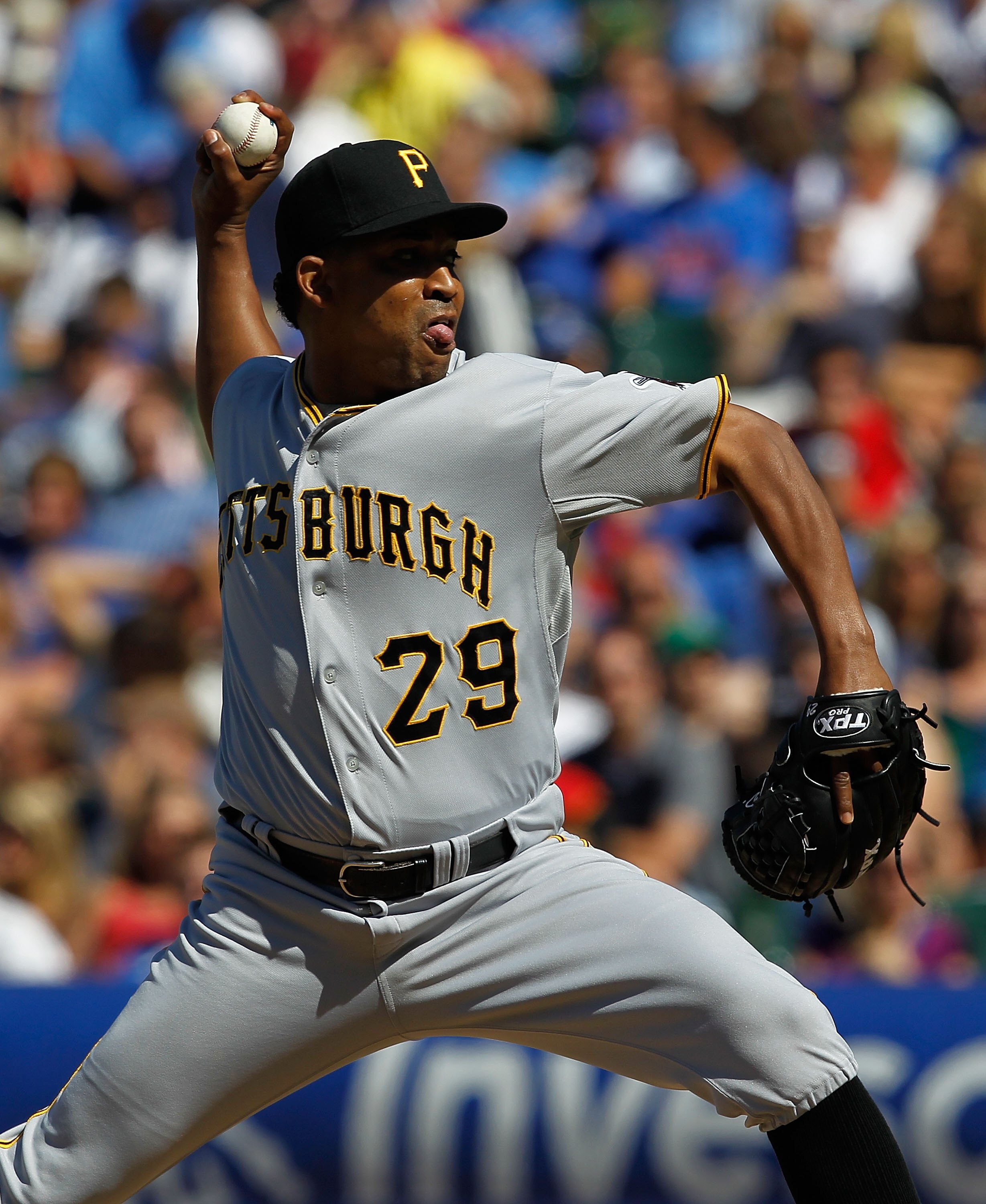 CHICAGO - JUNE 30: Octavio Dotel #29 of the Pittsburgh Pirates pitches in the 9th inning on his way to a save against the Chicago Cubs at Wrigley Field on June 30, 2010 in Chicago, Illinois. The Pirates defeated the Cubs 2-0. (Photo by Jonathan Daniel/Get