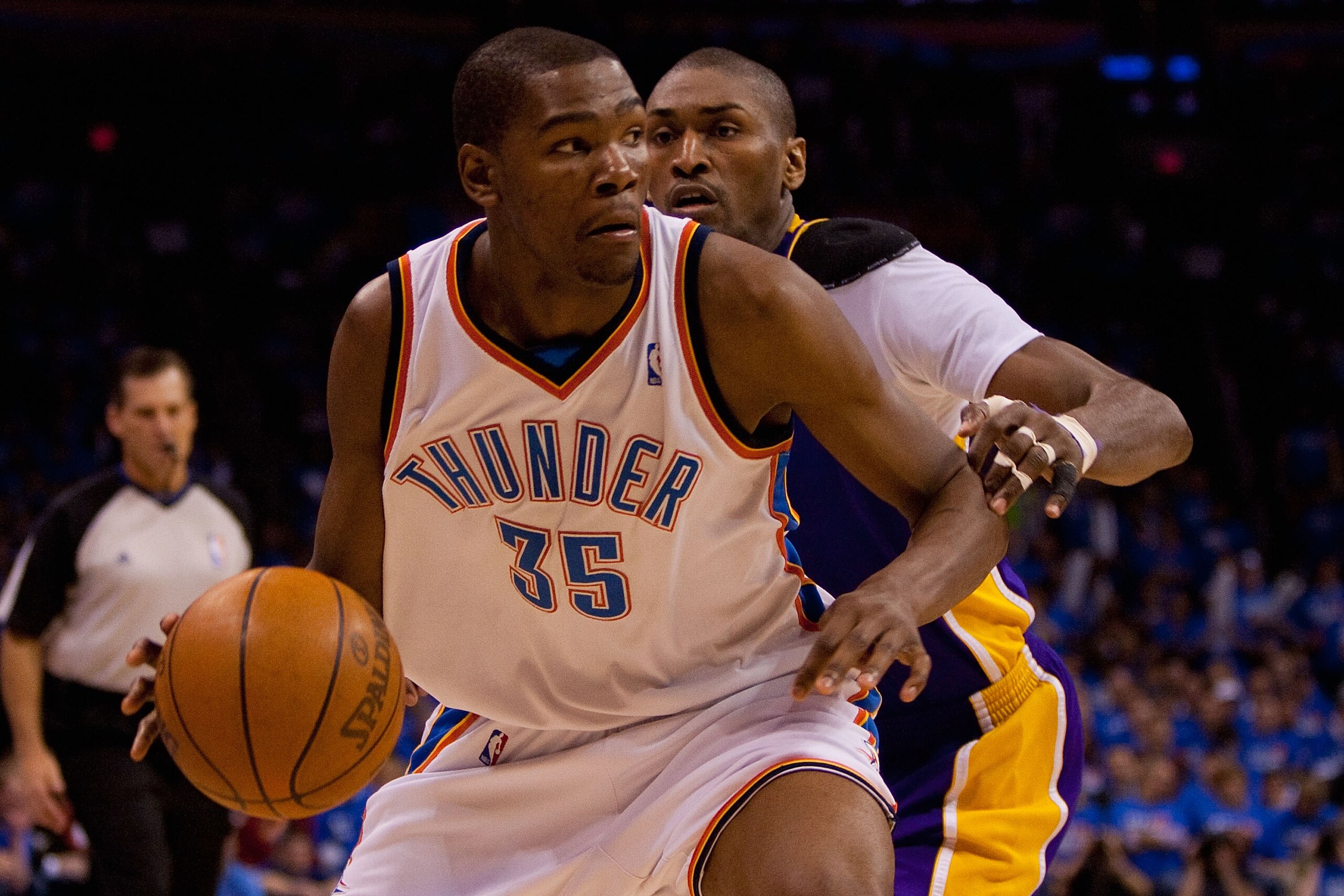 OKLAHOMA CITY - APRIL 30: Kevin Durant #35 of the Oklahoma City Thunder drives to the basket against Ron Artest #37 of the Los Angeles Lakers during Game Six of the Western Conference Quarterfinals of the 2010 NBA Playoffs on April 30, 2010 at the Ford C OKLAHOMA CITY - APRIL 30: Kevin Durant #35 of the Oklahoma City Thunder drives to the basket against Ron Artest #37 of the Los Angeles Lakers during Game Six of the Western Conference Quarterfinals of the 2010 NBA Playoffs on April 30, 2010 at the Ford C
