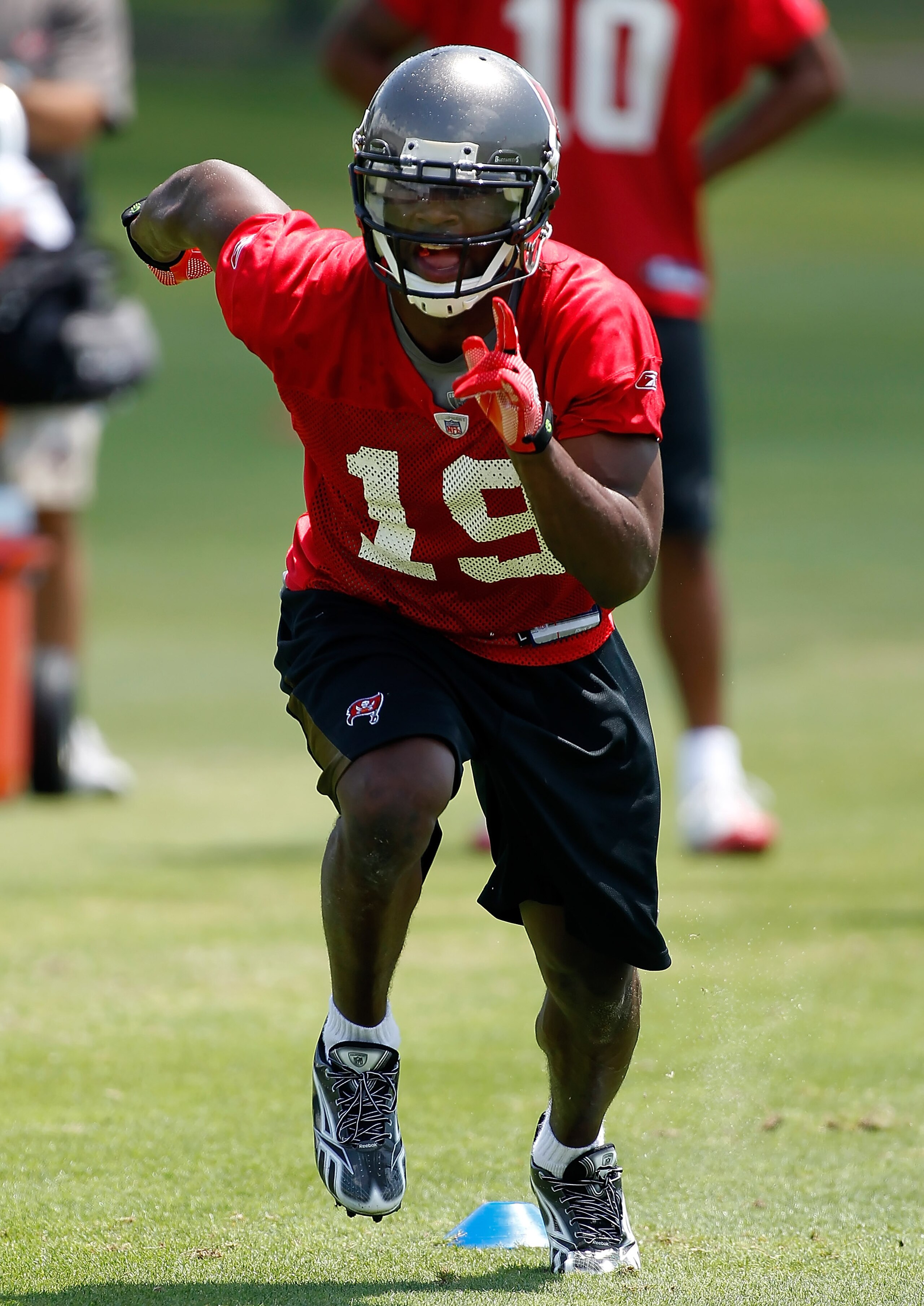 TAMPA, FL - MAY 01:  Receiver Mike Williams #19 of the Tampa Bay Buccaneers runs during the Buccaneers Rookie mini camp at One Buccaneer Place on May 1, 2010 in Tampa, Florida.  (Photo by J. Meric/Getty Images)