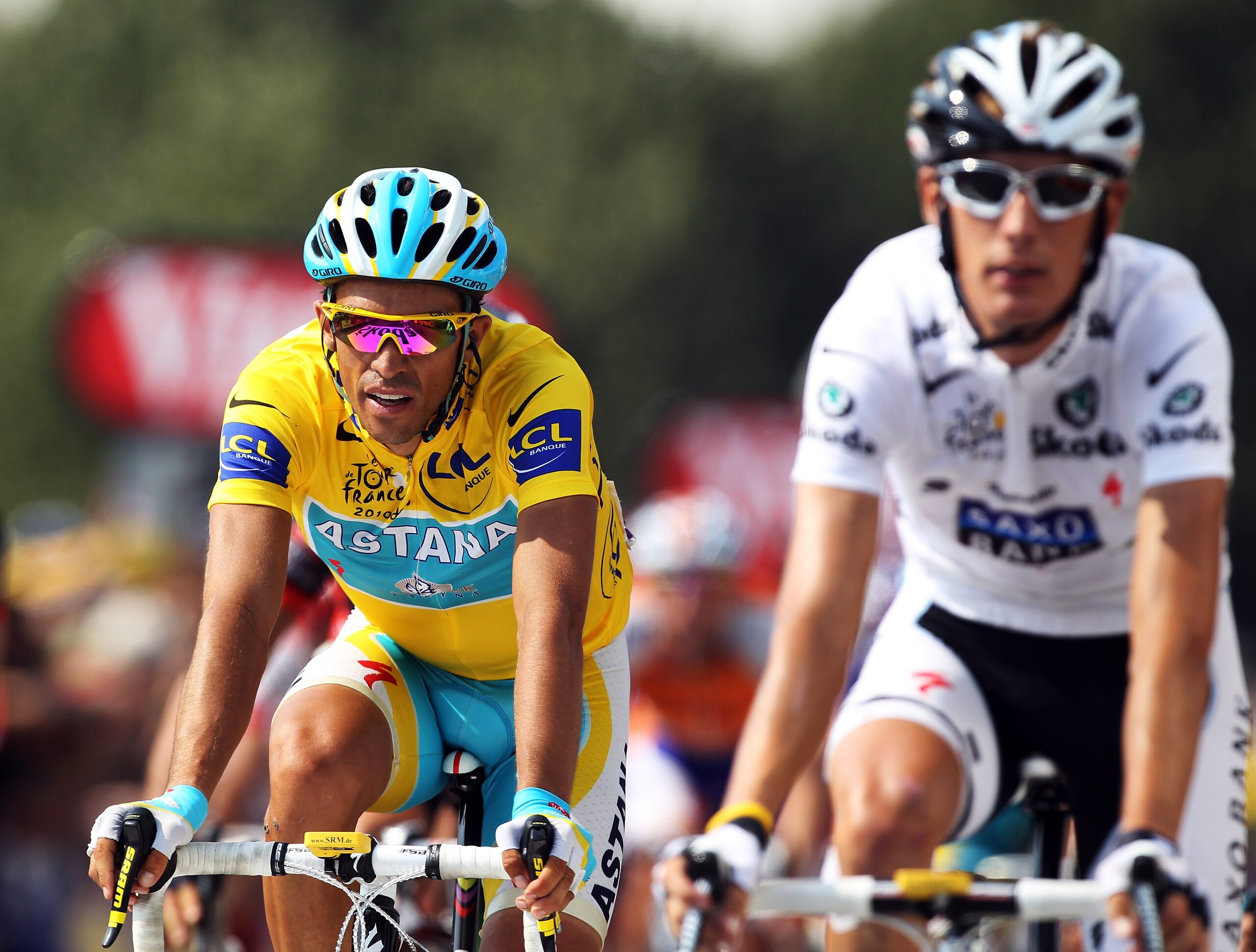 PAU, FRANCE - JULY 20: Race leader Alberto Contador (l) of Spain and the Astana team rides over the finish line alongside second placed Andy Schleck of Luxembourg and Team Saxo Bank on stage sixteen of the 2010 Tour de France from Bagneres-de-Luchon to P PAU, FRANCE - JULY 20: Race leader Alberto Contador (l) of Spain and the Astana team rides over the finish line alongside second placed Andy Schleck of Luxembourg and Team Saxo Bank on stage sixteen of the 2010 Tour de France from Bagneres-de-Luchon to P