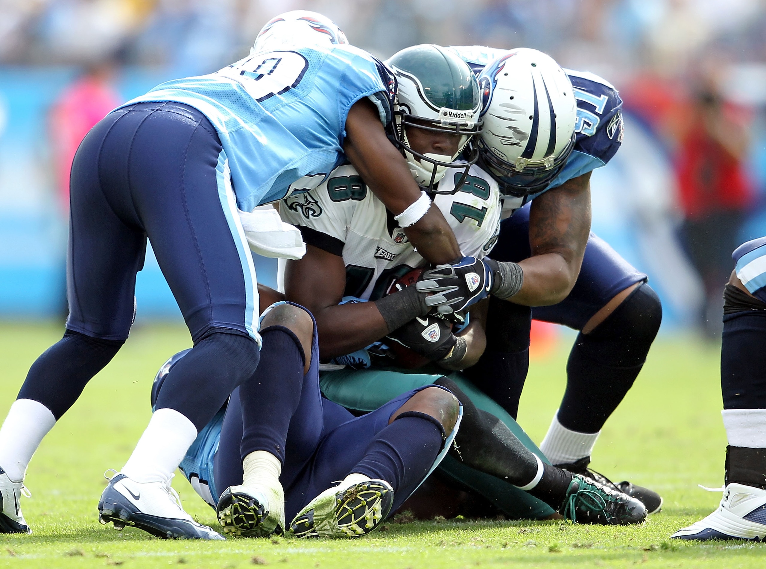 NASHVILLE, TN - OCTOBER 24: Jeremy Maclin #18 of the Philadelphia Eagles is tackled by the Tennessee Titans defense at LP Field on October 24, 2010 in Nashville, Tennessee.  (Photo by Andy Lyons/Getty Images)