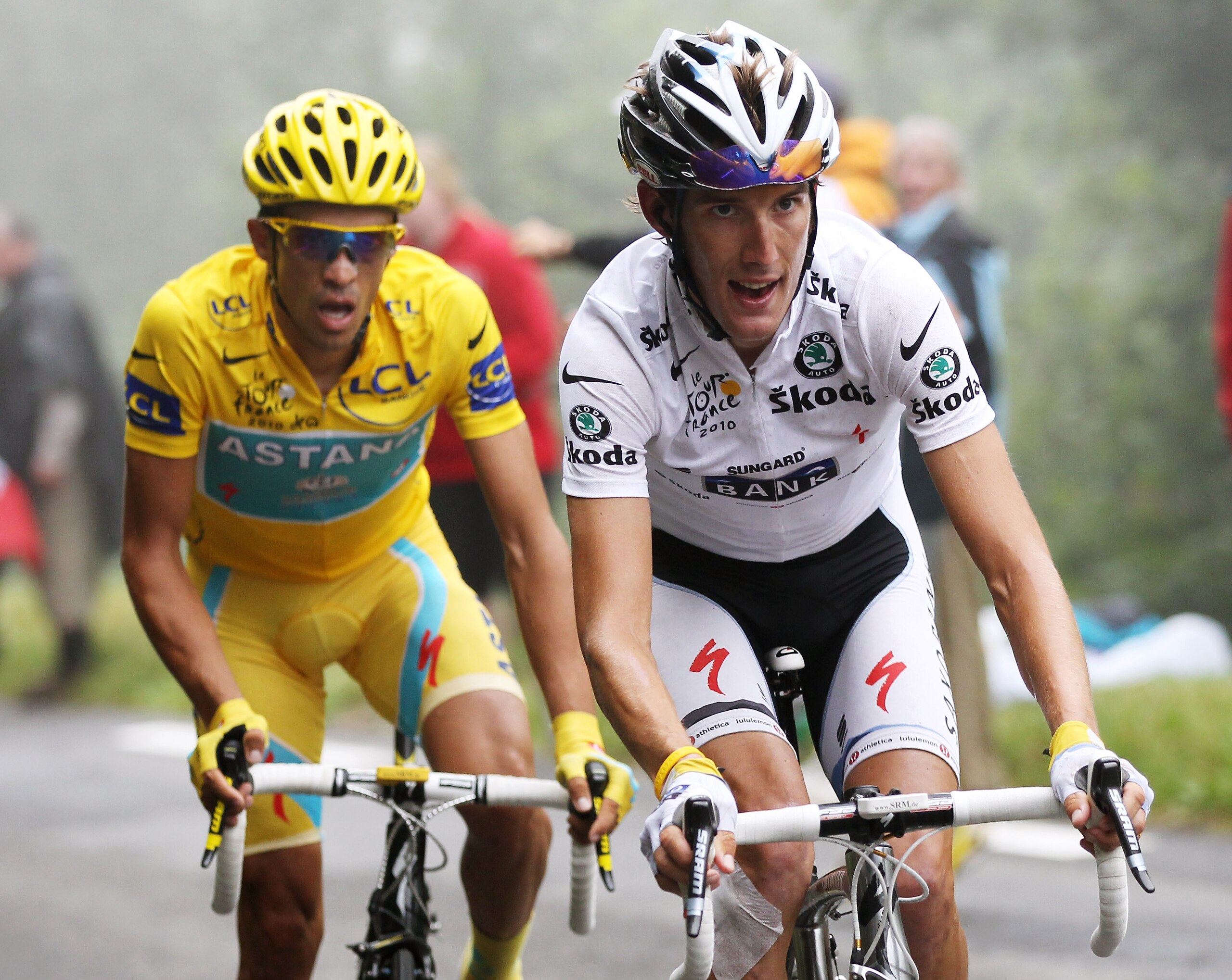 COL DU TOURMALET, FRANCE - JULY 22:  Andy Schleck of Luxembourg and Team Saxo Bank is followed by Alberto Contador of Spain and the Astana Team as he attacks up the slopes of the Col du Tourmalet during stage seventeen of the 2010 Tour de France from Pau 