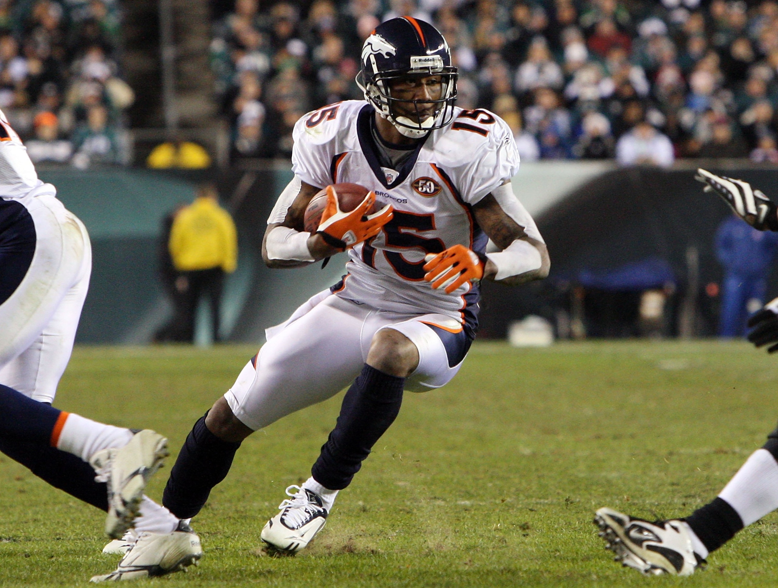 PHILADELPHIA - DECEMBER 27:  Brandon Marshall #15 of the Denver Broncos runs the ball against the Philadelphia Eagles on December 27, 2009 at Lincoln Financial Field in Philadelphia, Pennsylvania. The Eagles defeated the Broncos 30-27.  (Photo by Jim McIs