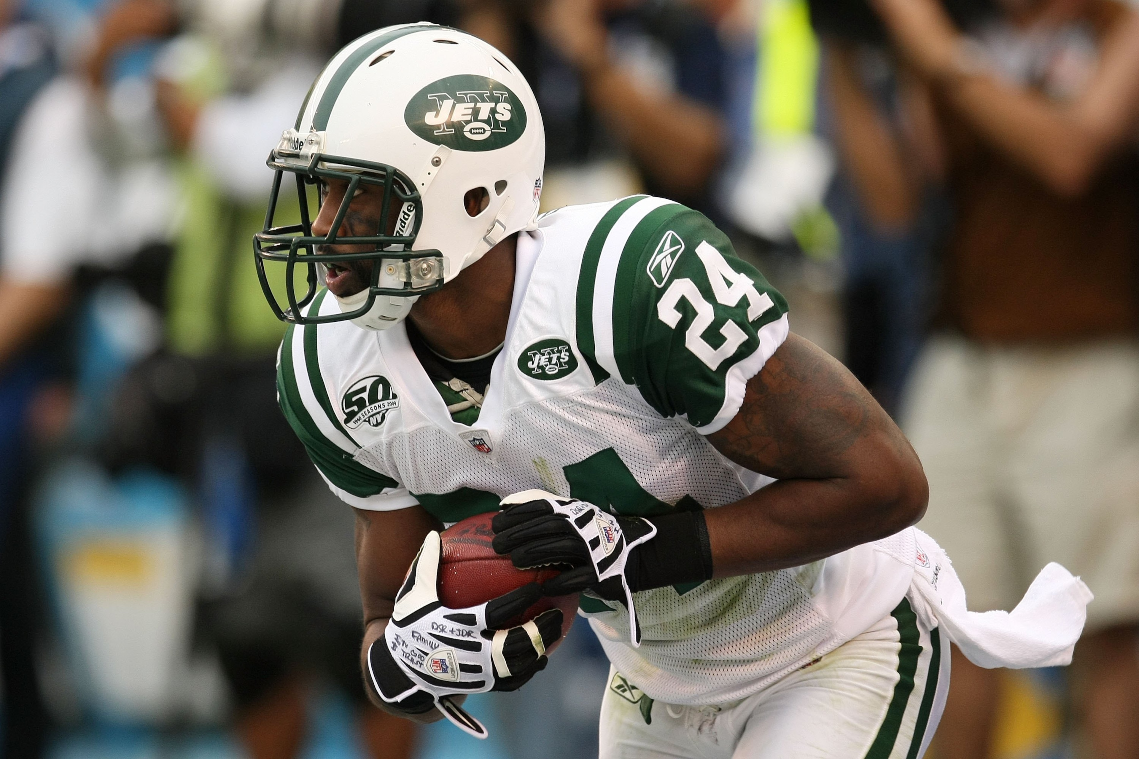 SAN DIEGO - JANUARY 17:  Darrelle Revis #24 of the New York Jets runs with the ball against the San Diego Chargers during AFC Divisional Playoff Game at Qualcomm Stadium on January 17, 2010 in San Diego, California. (Photo by Stephen Dunn/Getty Images)