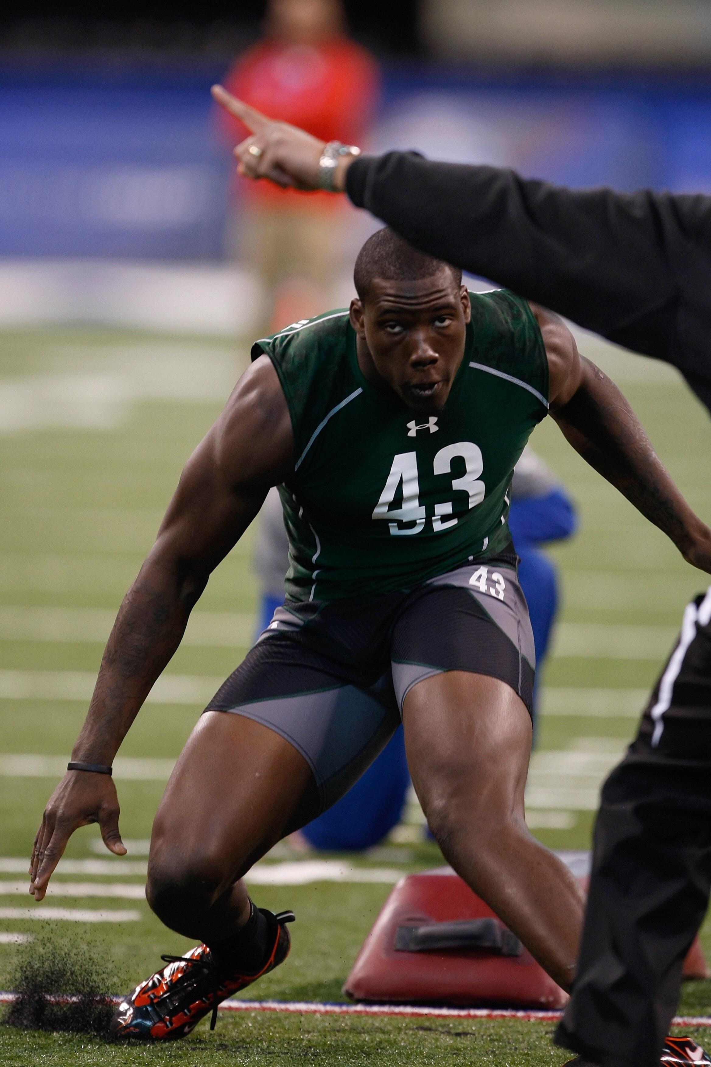 INDIANAPOLIS, IN - MARCH 1: Defensive lineman Jason Pierre-Paul of South Florida runs drills as he looks to a coach for direction during the NFL Scouting Combine presented by Under Armour at Lucas Oil Stadium on March 1, 2010 in Indianapolis, Indiana. (Ph