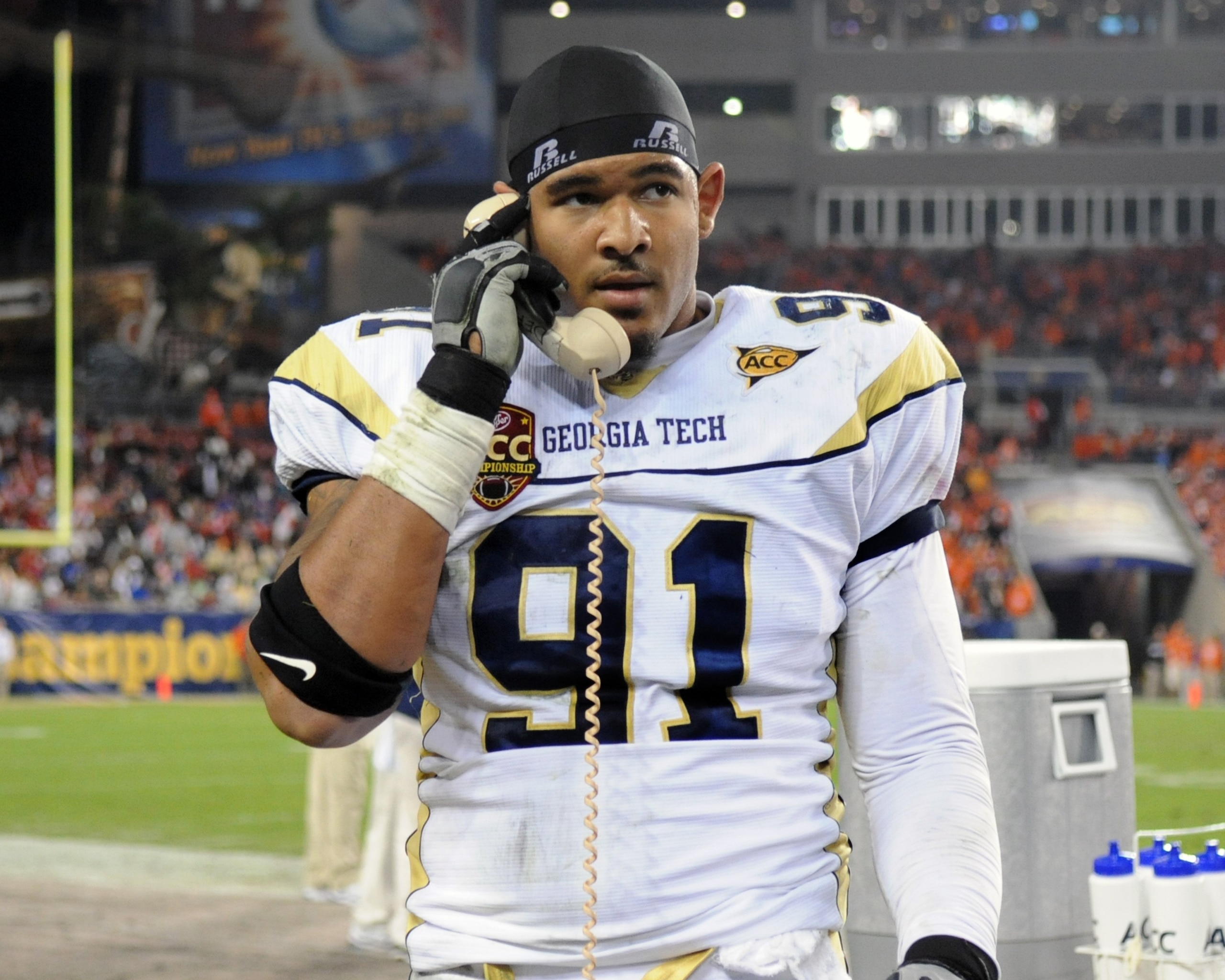 TAMPA, FL - NOVEMBER 28: Defensive end Derrick Morgan #91 of the Georgia Tech Yellow Jackets checks with coaches against the Clemson Tigers in the 2009 ACC Football Championship Game December 5, 2009 at Raymond James Stadium in Tampa, Florida.  (Photo by 