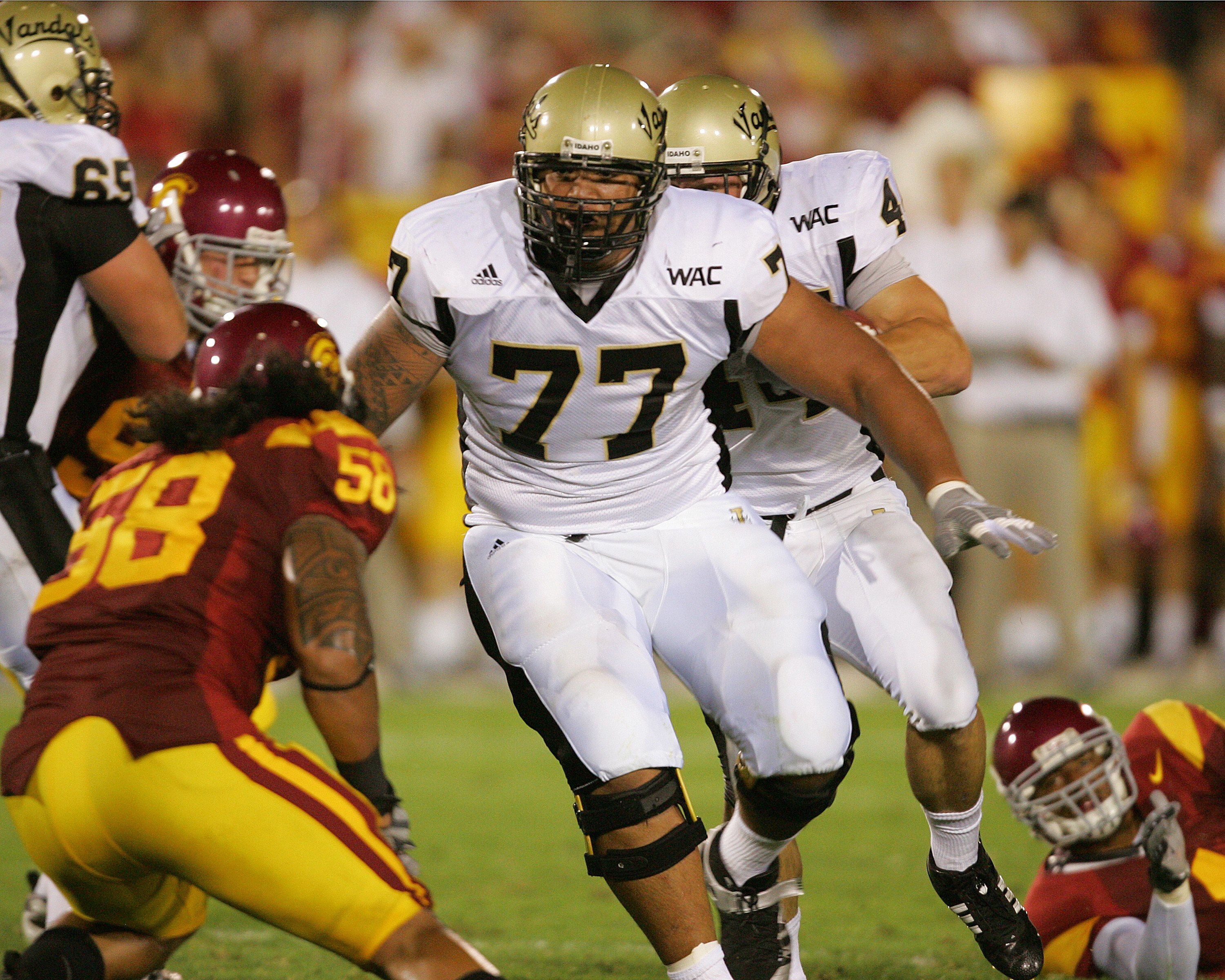 LOS ANGELES - SEPTEMBER 1:  Idaho guard Mike Iupati #77 leads block against USC at the Los Angeles Memorial Coliseum on September 1, 2007 in Los Angeles, California. The Vandals were defeated by the top-ranked Trojans won 38-10. (Photo by Kevin Terrell/Ge