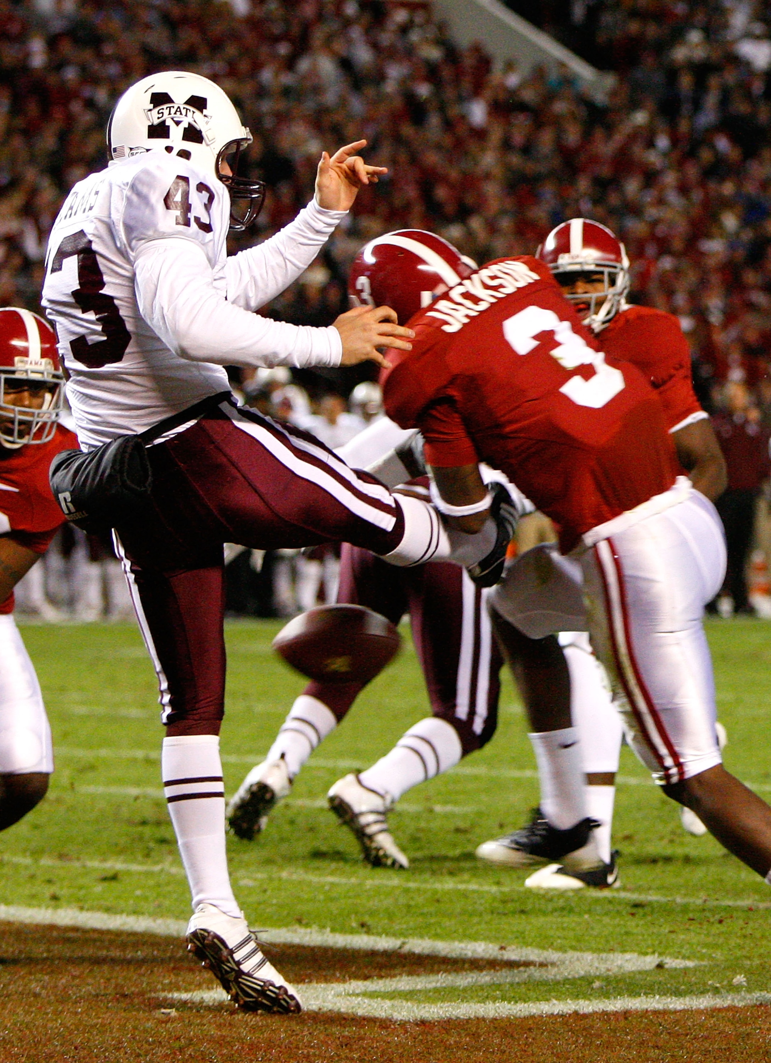 TUSCALOOSA, AL - NOVEMBER 15:  Kareem Jackson #3 of the Alabama Crimson Tide blocks a punt by Blake McAdams #43 of the Mississippi State Bulldogs for a safety during the game at Bryant-Denny Stadium on November 15, 2008 in Tuscaloosa, Alabama.  (Photo by 