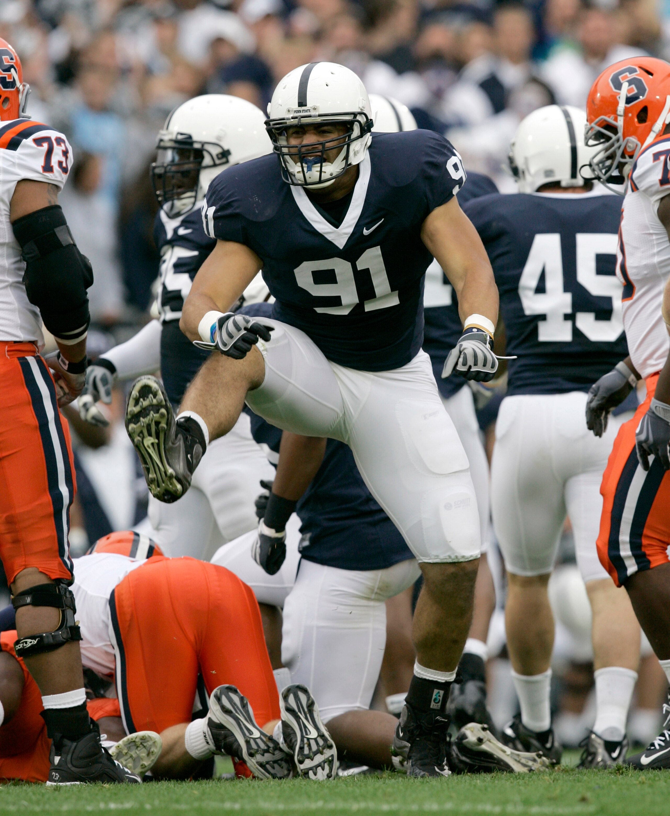 STATE COLLEGE, PA - SEPTEMBER 12: Tackle Jared Odrick #91of the Penn State Nittany Lions celebrates sacking quarterback Greg Paulus of the Syracuse Orangemen during the first half at Beaver Stadium  September 12, 2009 in State College, Pennsylvania. (Phot