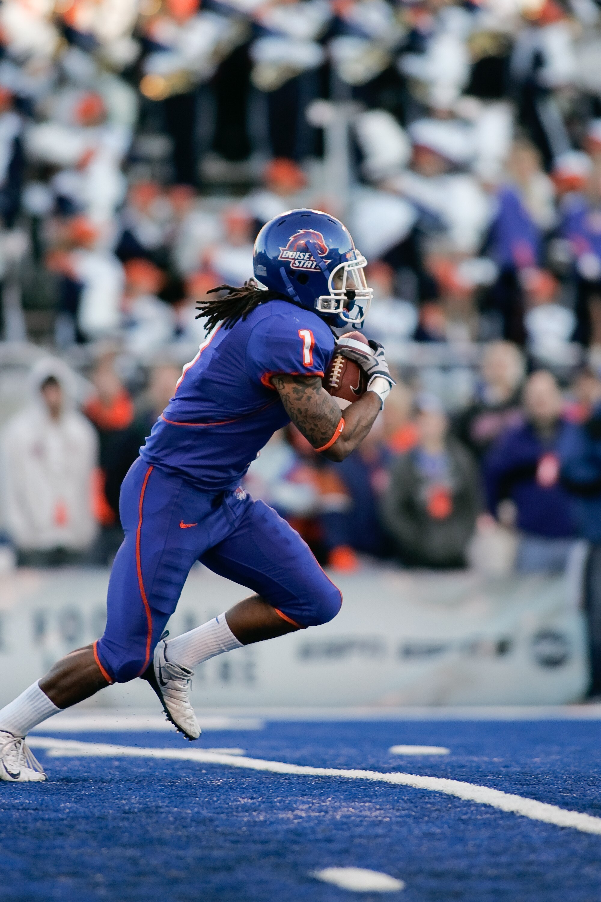 BOISE, ID - NOVEMBER 28: Kyle Wilson #1 of the Boise State Broncos runs against the Fresno State Bulldogs during their game on November 28, 2008 at Bronco Stadium in Boise, Idaho.  (Photo by Otto Kitsinger III/Getty Images)
