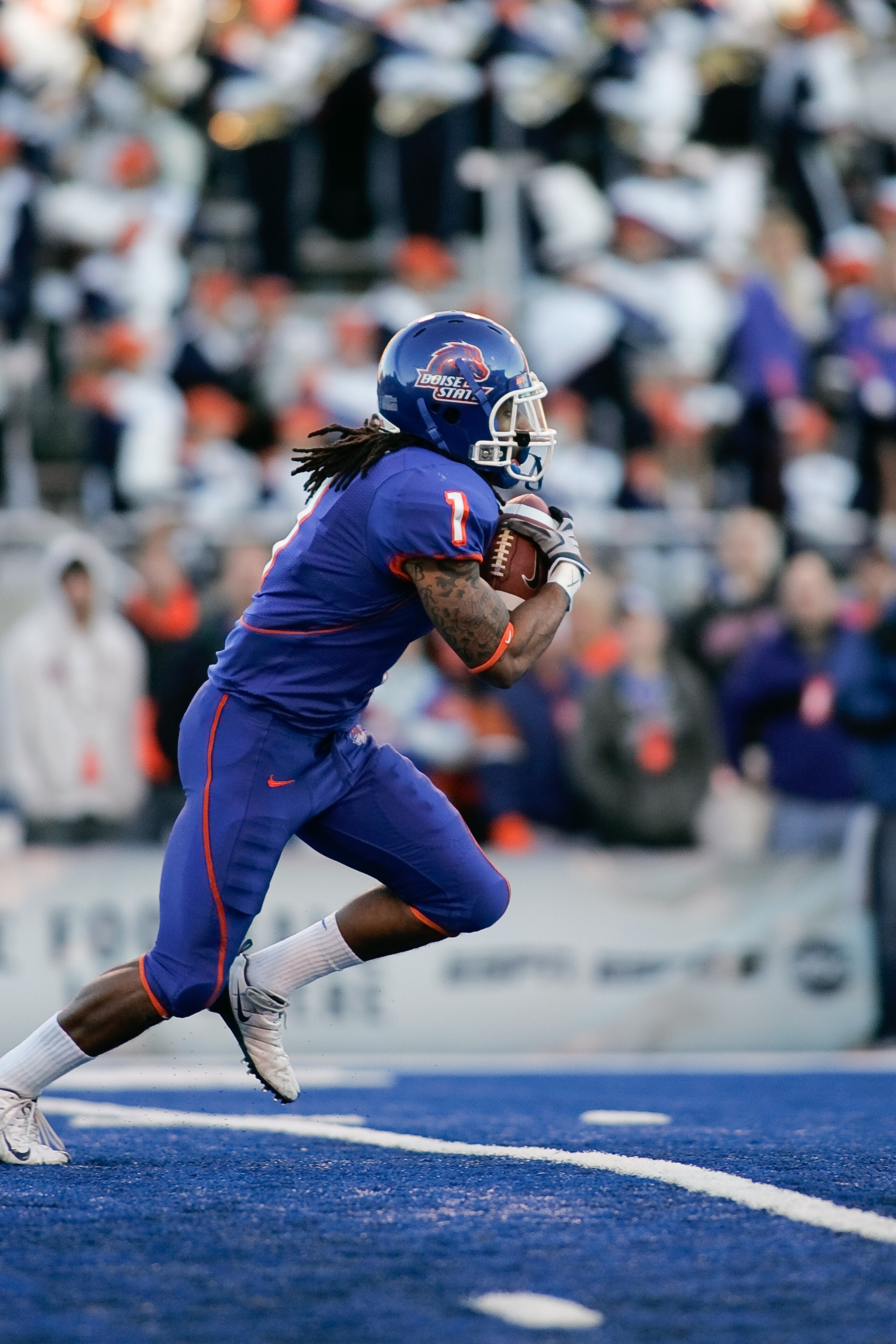 BOISE, ID - NOVEMBER 28: Kyle Wilson #1 of the Boise State Broncos runs against the Fresno State Bulldogs during their game on November 28, 2008 at Bronco Stadium in Boise, Idaho.  (Photo by Otto Kitsinger III/Getty Images)