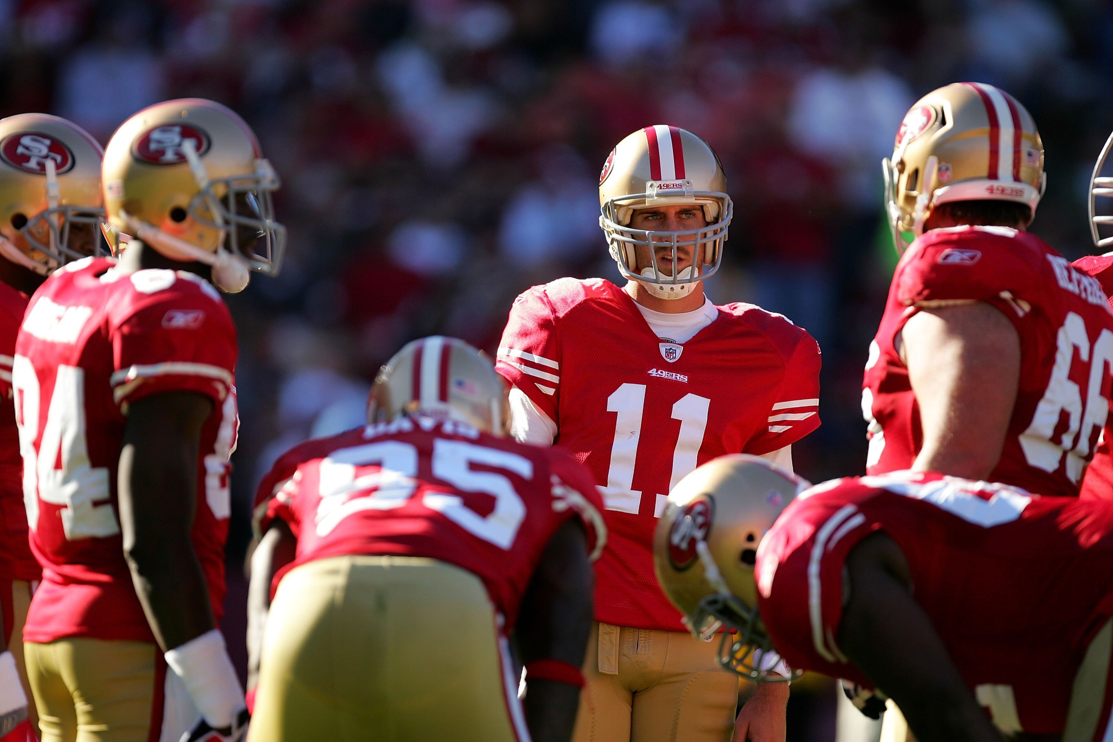 SAN FRANCISCO - NOVEMBER 29: Alex Smith #11 of the San Francisco 49ers talks to his team in the huddle during their game against the Jacksonville Jaguars at Candlestick Park on November 29, 2009 in San Francisco, California. (Photo by Ezra Shaw/Getty Im SAN FRANCISCO - NOVEMBER 29: Alex Smith #11 of the San Francisco 49ers talks to his team in the huddle during their game against the Jacksonville Jaguars at Candlestick Park on November 29, 2009 in San Francisco, California. (Photo by Ezra Shaw/Getty Im