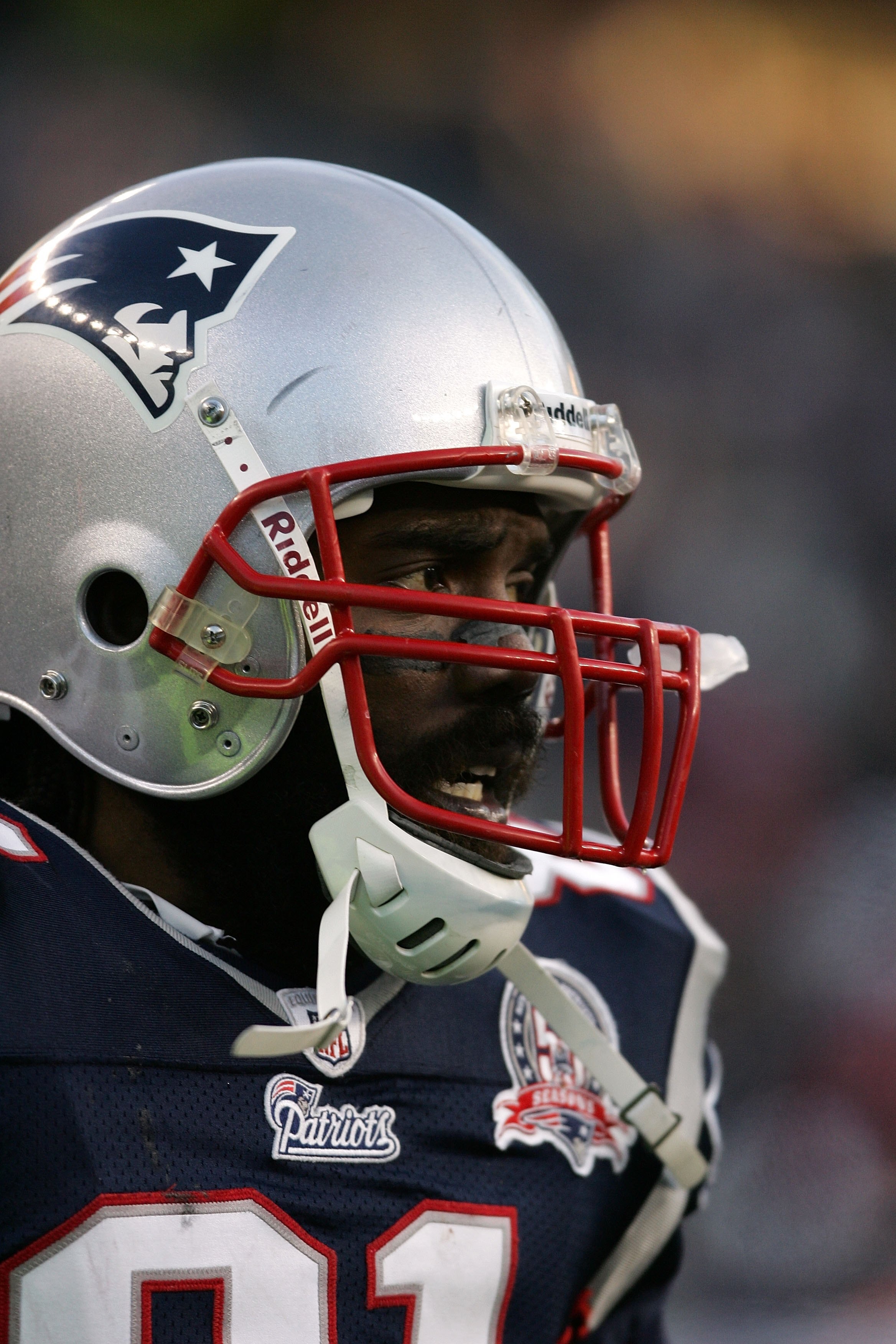 FOXBORO, MA - JANUARY 10:  Randy Moss #81 of the New England Patriots looks on against the Baltimore Ravens during the 2010 AFC wild-card playoff game at Gillette Stadium on January 10, 2010 in Foxboro, Massachusetts. The Ravens won 33-14. (Photo by Elsa/