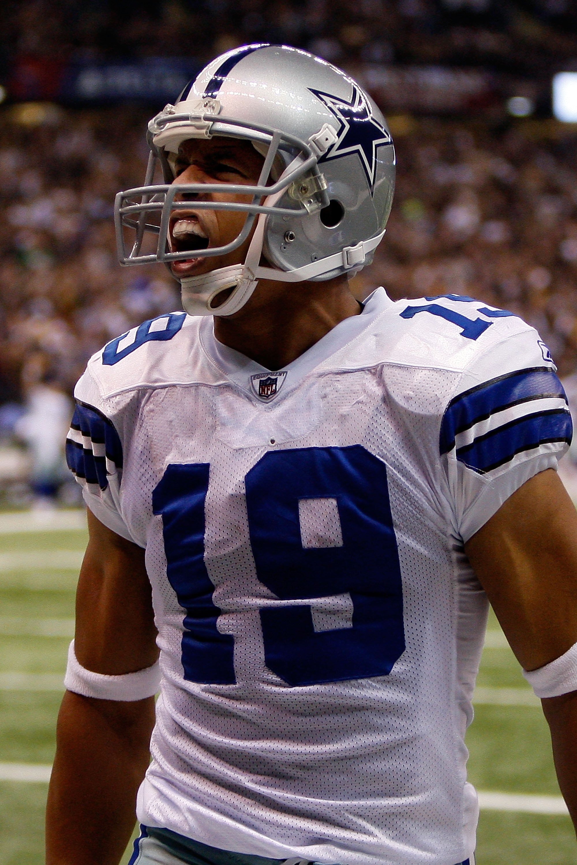 NEW ORLEANS - DECEMBER 19:  Miles Austin #19 of the Dallas Cowboys celebrates after scoring a touchdown against the New Orleans Saints at Louisiana Superdome on December 19, 2009 in New Orleans, Louisiana.  (Photo by Chris Graythen/Getty Images)