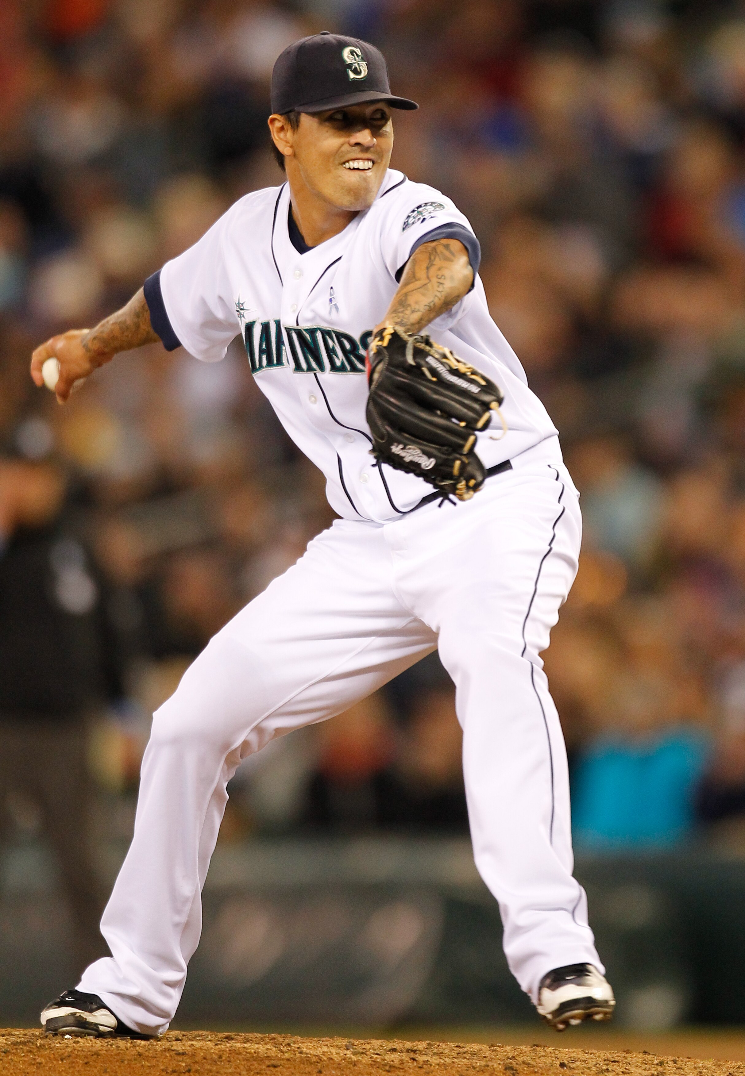SEATTLE - JUNE 20:  Relief pitcher Brandon League #43 of the Seattle Mariners pitches against the Cincinnati Reds on June 20, 2010 at Safeco Field in Seattle, Washington. (Photo by Otto Greule Jr/Getty Images)