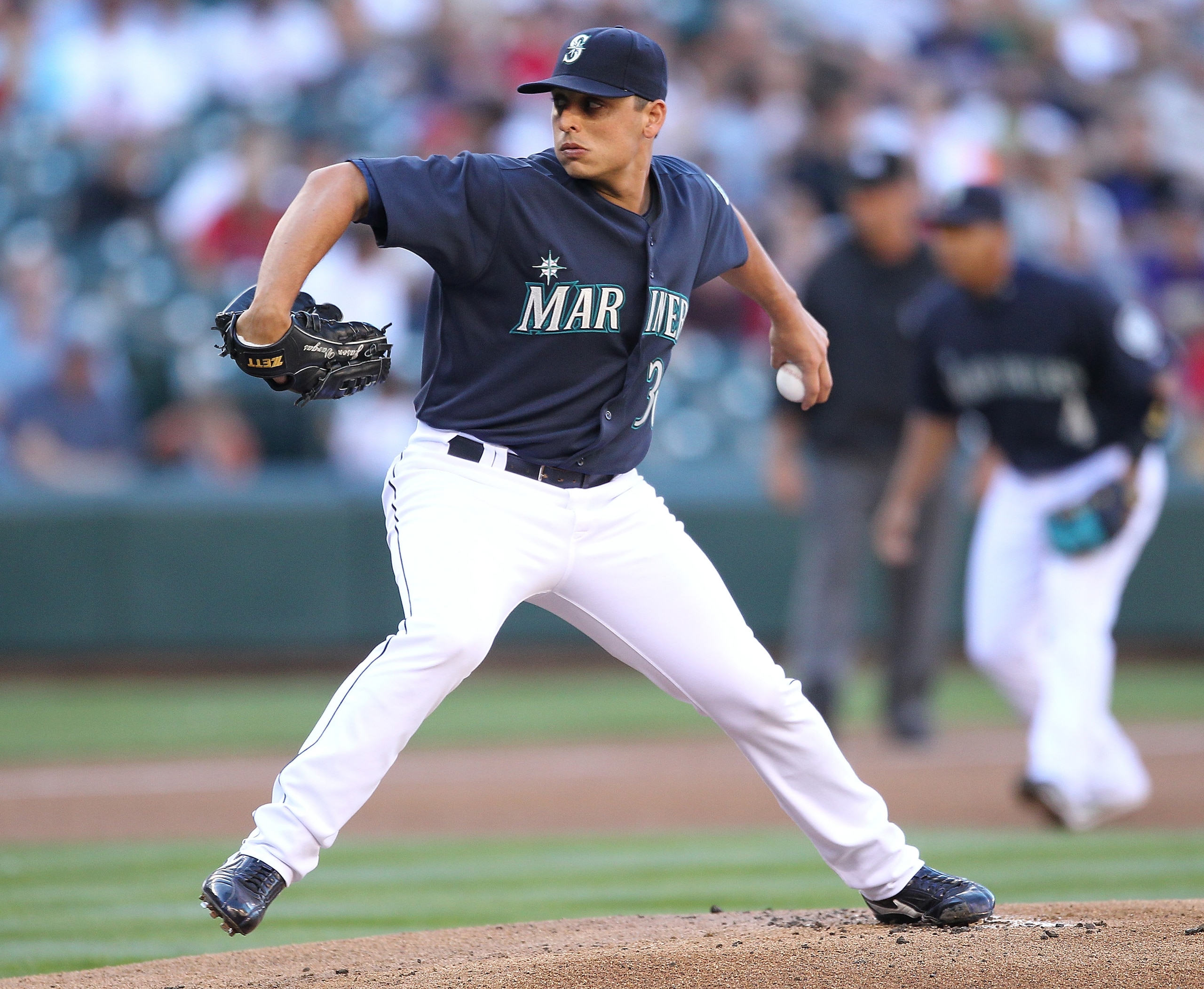 SEATTLE - JULY 23:  Starting pitcher Jason Vargas #38 of the Seattle Mariners pitches against the Boston Red Sox at Safeco Field on July 23, 2010 in Seattle, Washington. (Photo by Otto Greule Jr/Getty Images)