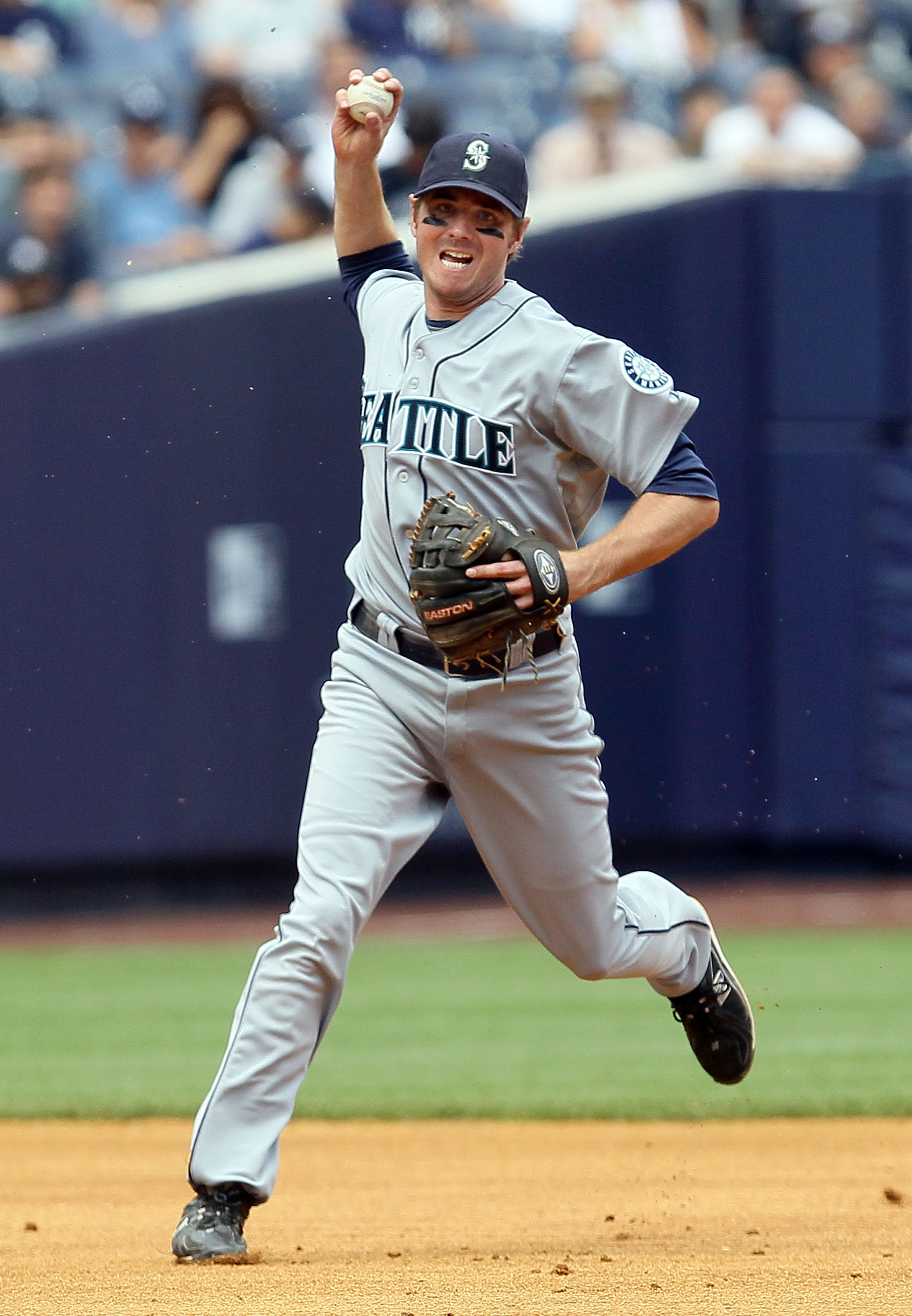 NEW YORK - JULY 01:  Josh Wilson #16 of the Seattle Mariners throws to first base for an out against Derek Jeter (not pictured) of the New York Yankees in the fifth inning on July 1, 2010 at Yankee Stadium in the Bronx borough of New York City.  (Photo by