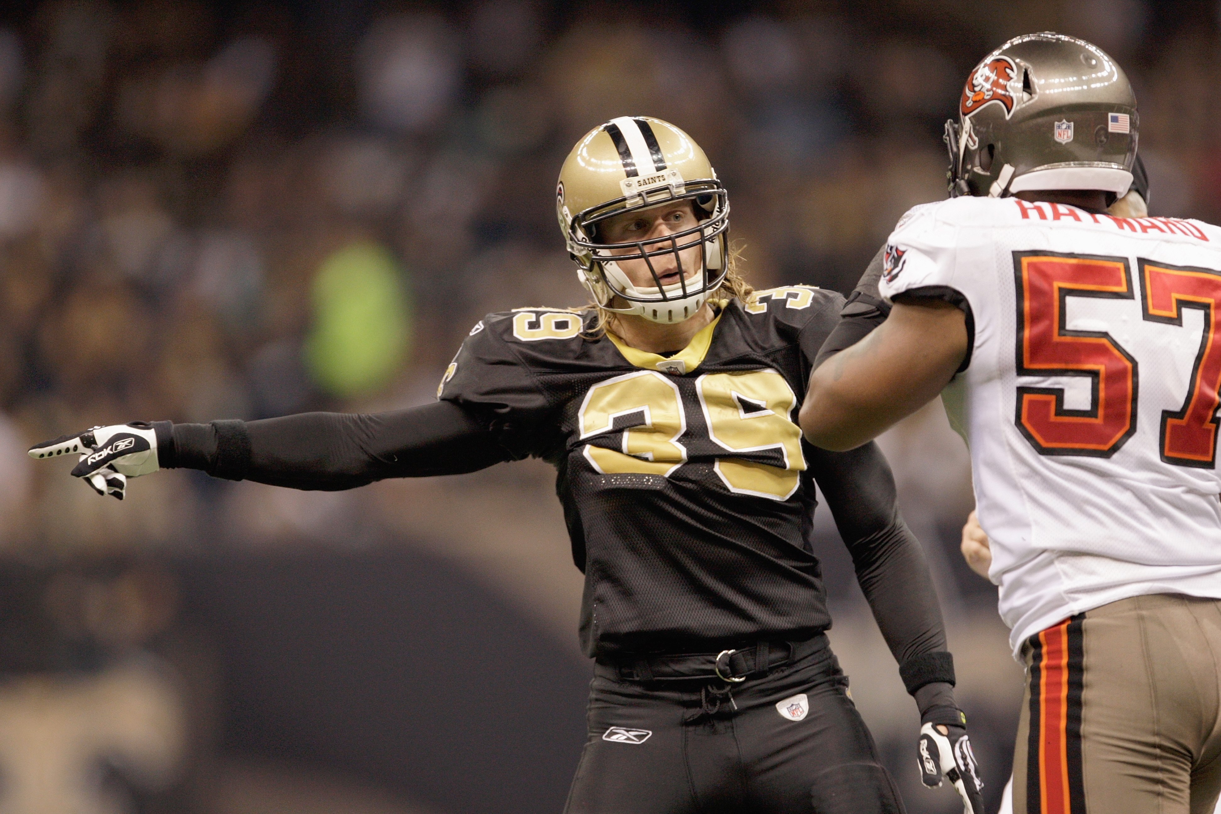 NEW ORLEANS - DECEMBER 27: Chris Reis #39 of the New Orleans Saints motions on the field during the game against the Tampa Bay Buccaneers on December 27, 2009 at Louisiana Superdome in New Orleans, Louisiana. (Photo by Jamie Squire/Getty Images)