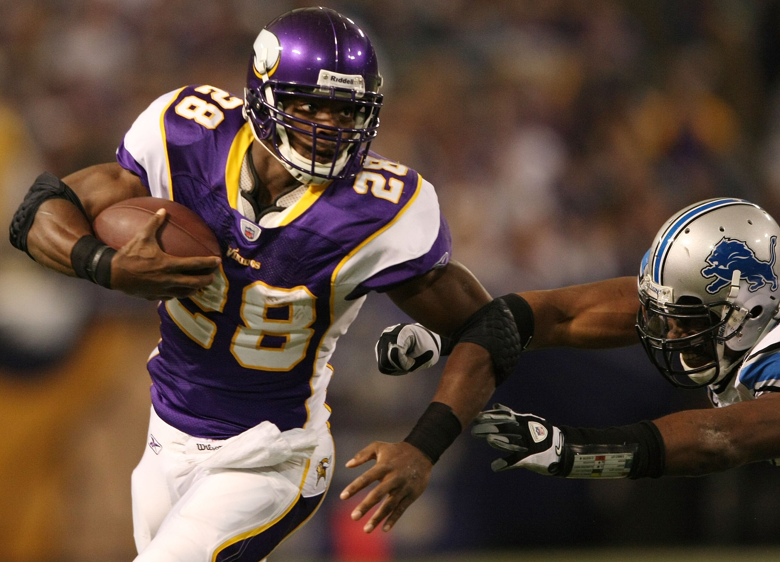 MINNEAPOLIS - NOVEMBER 15:  Adrian Peterson #28 of the Minnesota Vikings carries the ball as Julian Peterson #59 of the Detroit Lions defends on November 15, 2009 at Hubert H. Humphrey Metrodome in Minneapolis, Minnesota.  (Photo by Elsa/Getty Images)