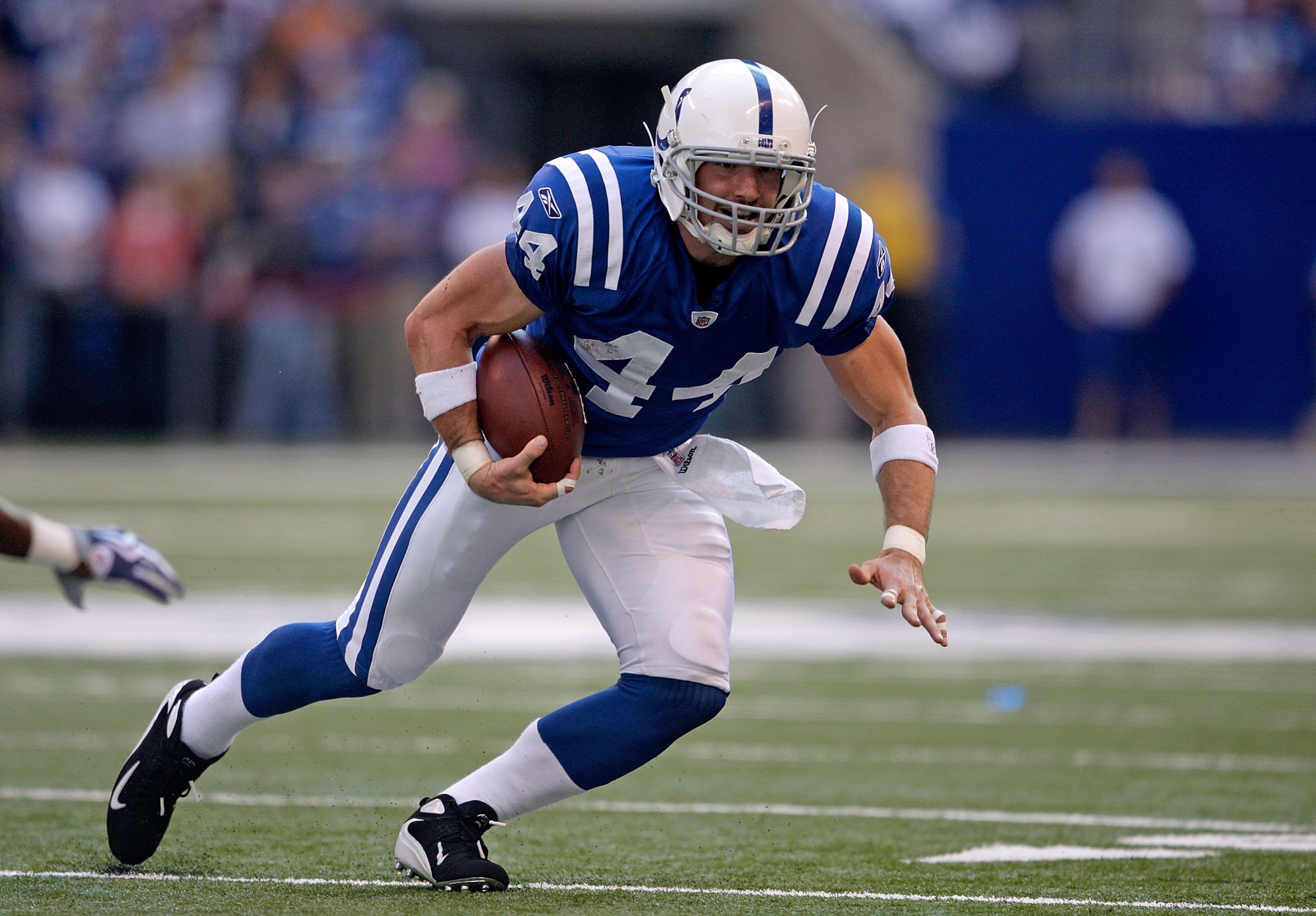 INDIANAPOLIS - NOVEMBER 8:  Dallas Clark #44 of the Indianapolis Colts runs with the ball during the NFL game against the Houston Texans at Lucas Oil Stadium on November 8, 2009 in Indianapolis, Indiana.  The Colts defeated the Texans 20-17.  (Photo by An