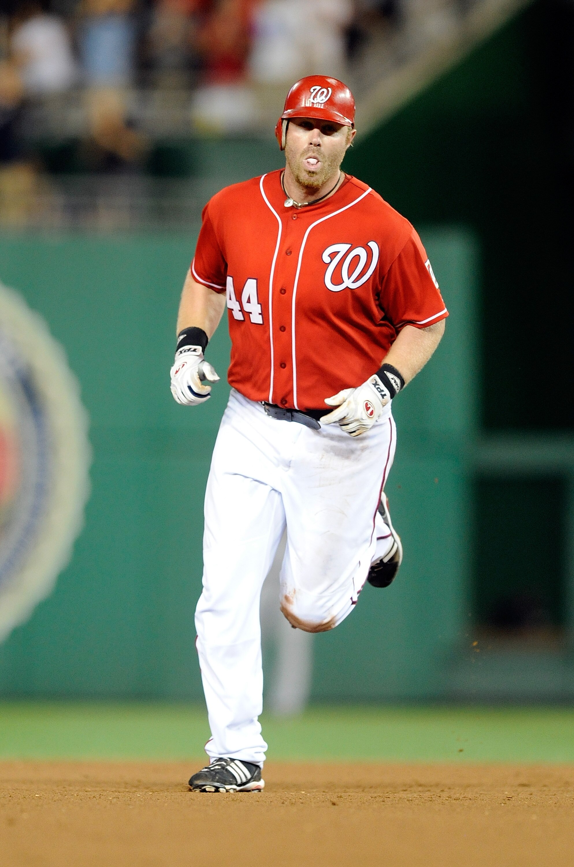 WASHINGTON - JULY 09:  Adam Dunn #44 of the Washington Nationals rounds the bases after hitting a home run in the seventh inning against the San Francisco Giants at Nationals Park on July 9, 2010 in Washington, DC.  Dunn hit two home runs in the Nationals