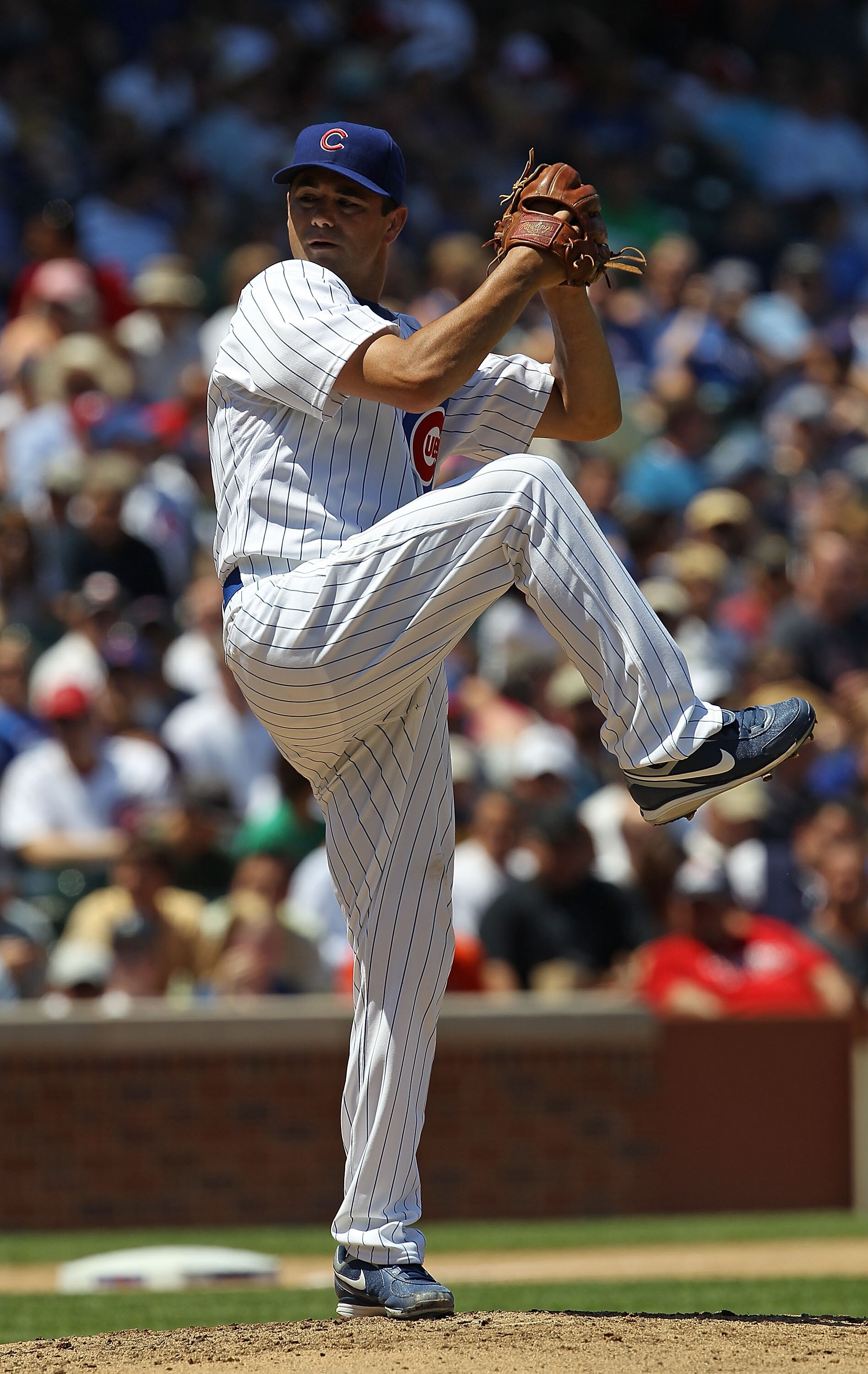 CHICAGO - JULY 16: Starting pitcher Ted Lilly #30 of the Chicago Cubs delivers the ball against the Philadelphia Phillies at Wrigley Field on July 16, 2010 in Chicago, Illinois. The Cubs defeated the Phillies 4-3. (Photo by Jonathan Daniel/Getty Images)