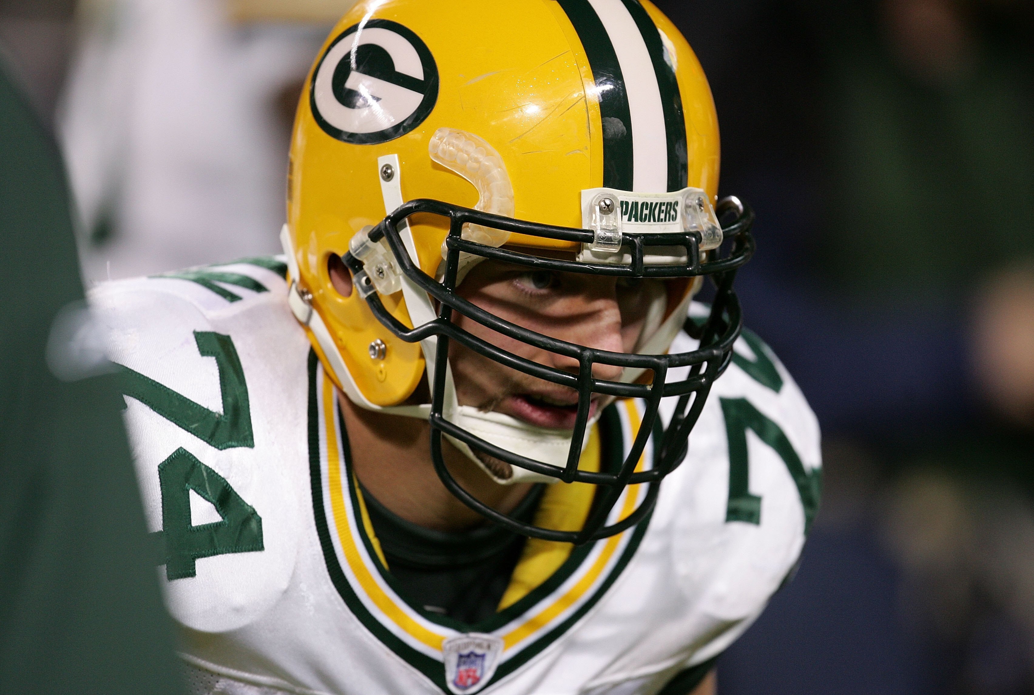 CHICAGO - DECEMBER 31:  Defensive end Aaron Kampman #74 of the Green Bay Packers is seen on the field during warm-ups against the Chicago Bears December 31, 2006 at Soldier Field in Chicago, Illinois. The Packers won 26-7.  (Photo by Jonathan Daniel/Getty