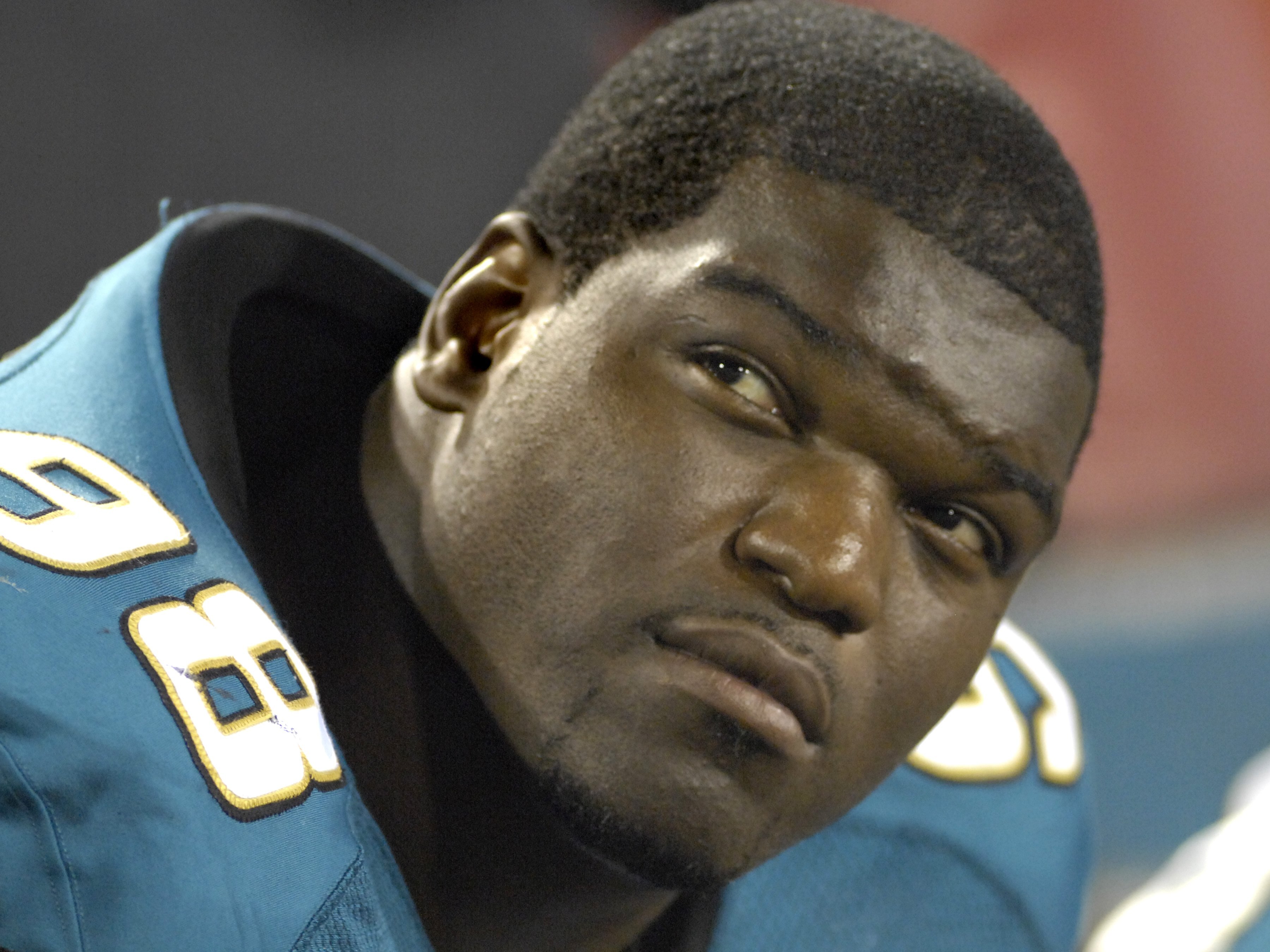 JACKSONVILLE, FL - AUGUST 18: Defensive tackle John Henderson #98 of the Jacksonville Jaguars watches play against the Tampa Bay Buccaneers  at Jacksonville  Municipal Stadium on August 18, 2007 in Jacksonville, Florida. (Photo by Al Messerschmidt/Getty I