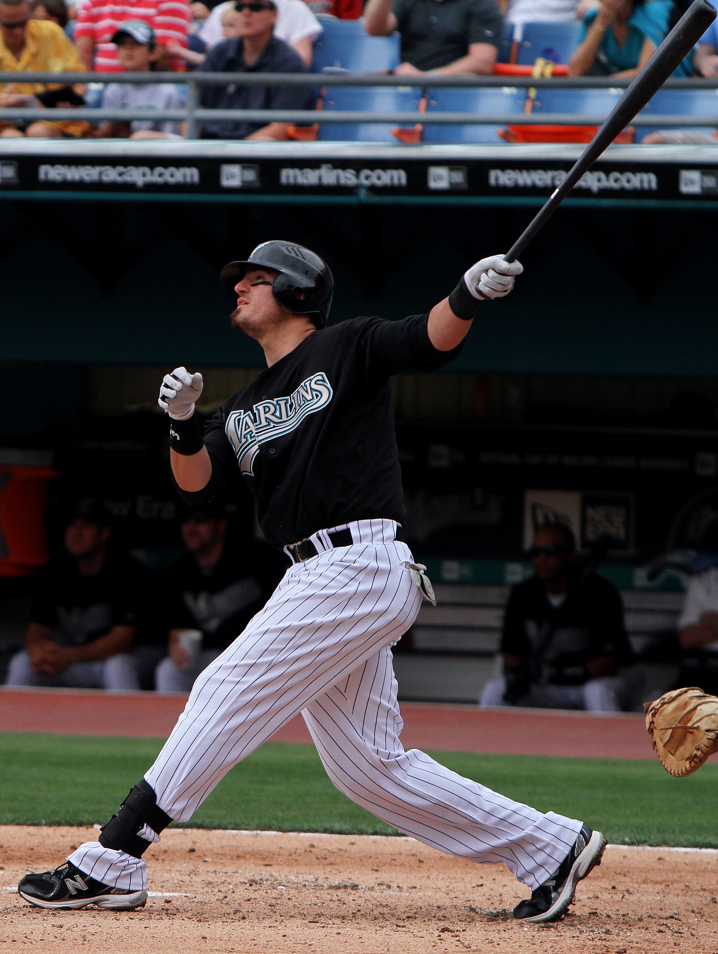MIAMI - APRIL 11: Third baseman Jorge Cantu #3 of the Florida Marlins follows through on a three-run home run against the Los Angeles Dodgers at Sun Life Stadium on April 11, 2010 in Miami, Florida. The Marlins defeated the Dodgers 6-5.  (Photo by Doug Be