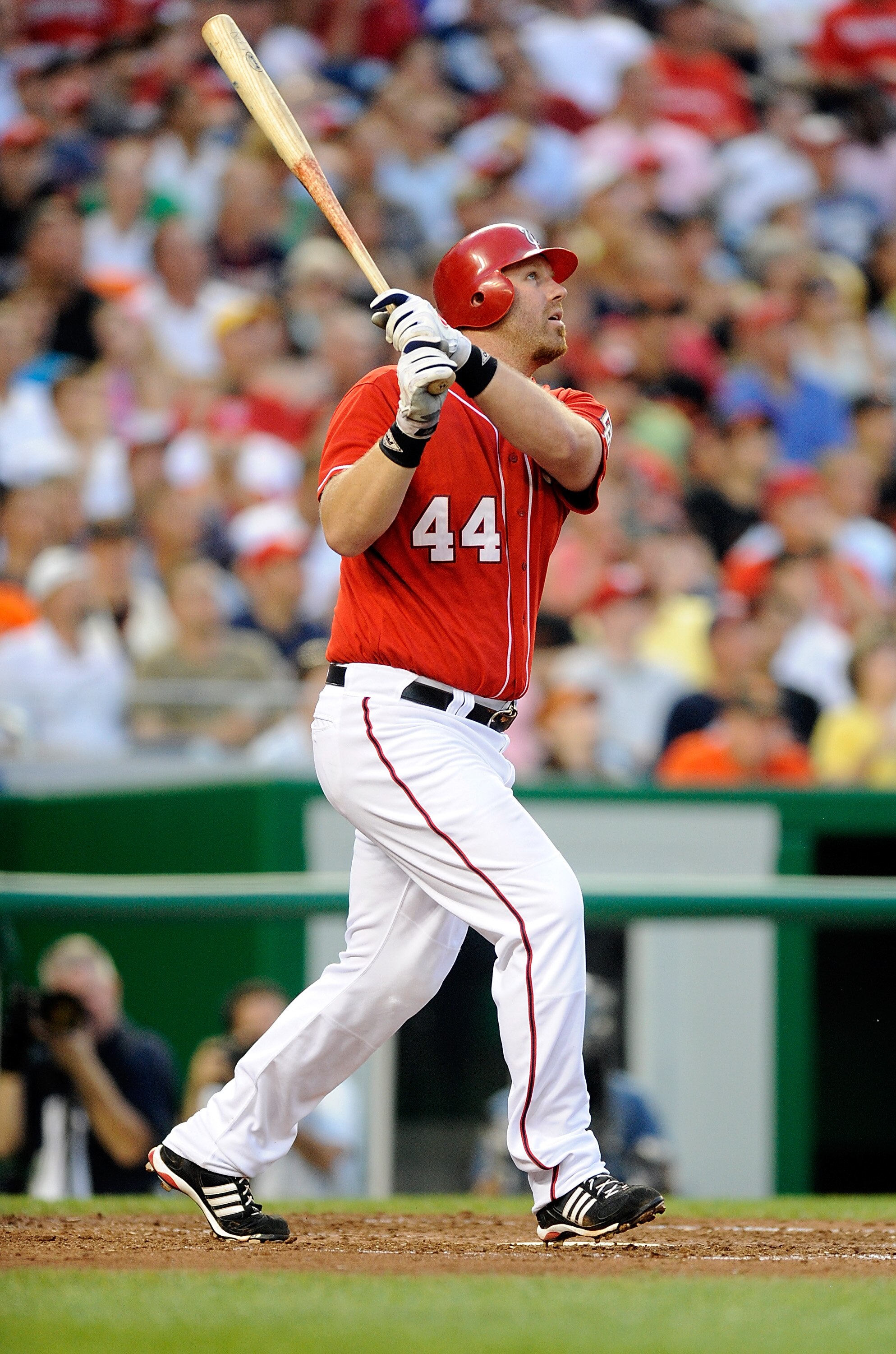 WASHINGTON - JULY 09:  Adam Dunn #44 of the Washington Nationals hits a home run in the fourth inning against the San Francisco Giants at Nationals Park on July 9, 2010 in Washington, DC.  (Photo by Greg Fiume/Getty Images)