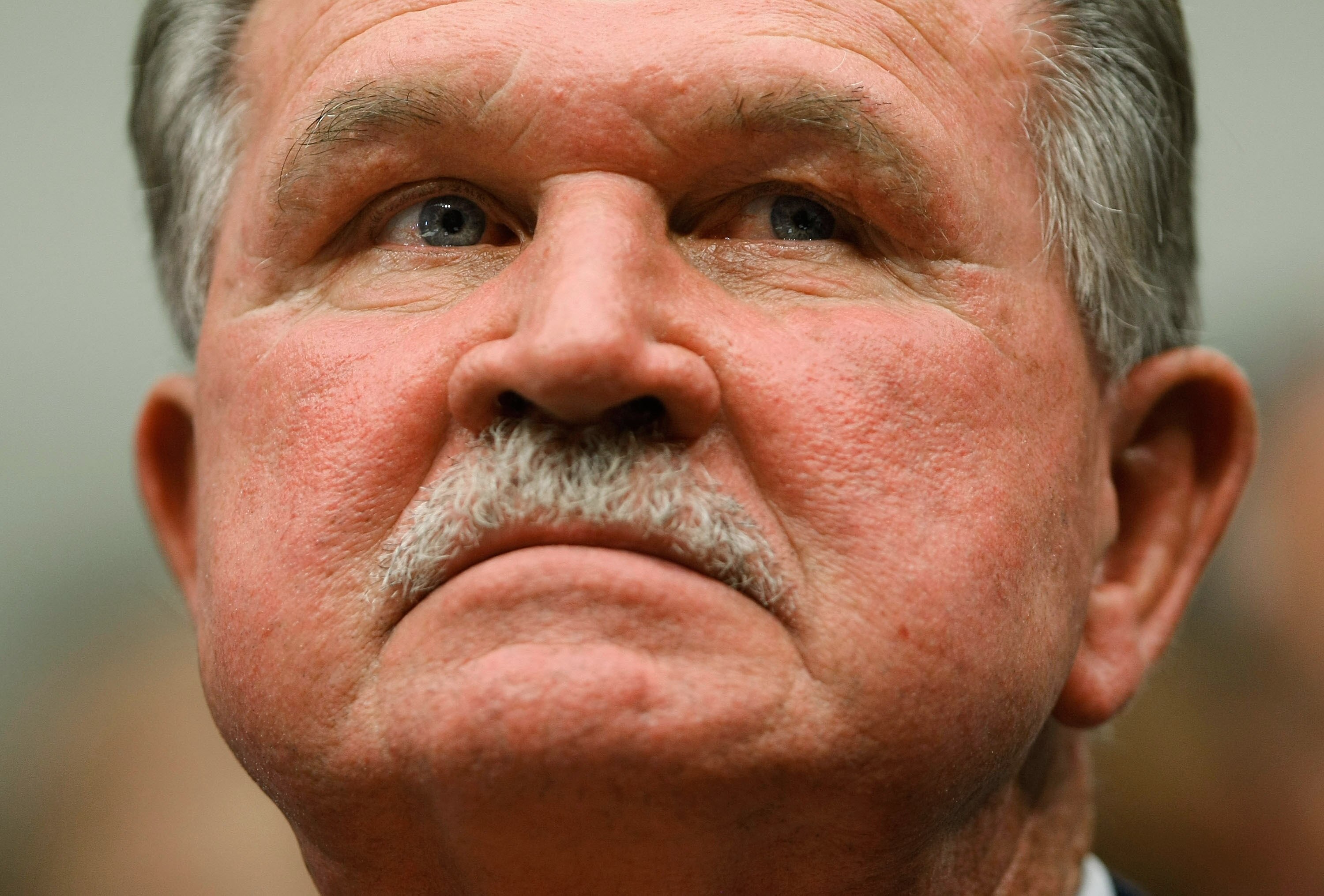 WASHINGTON - JUNE 26:  During a congressional hearing on the National Football League's system for compensating retired players, Hall of Fame tight end and head coach Mike Ditka listens to testimony June 26, 2007 in Washington, DC. Former players and coac