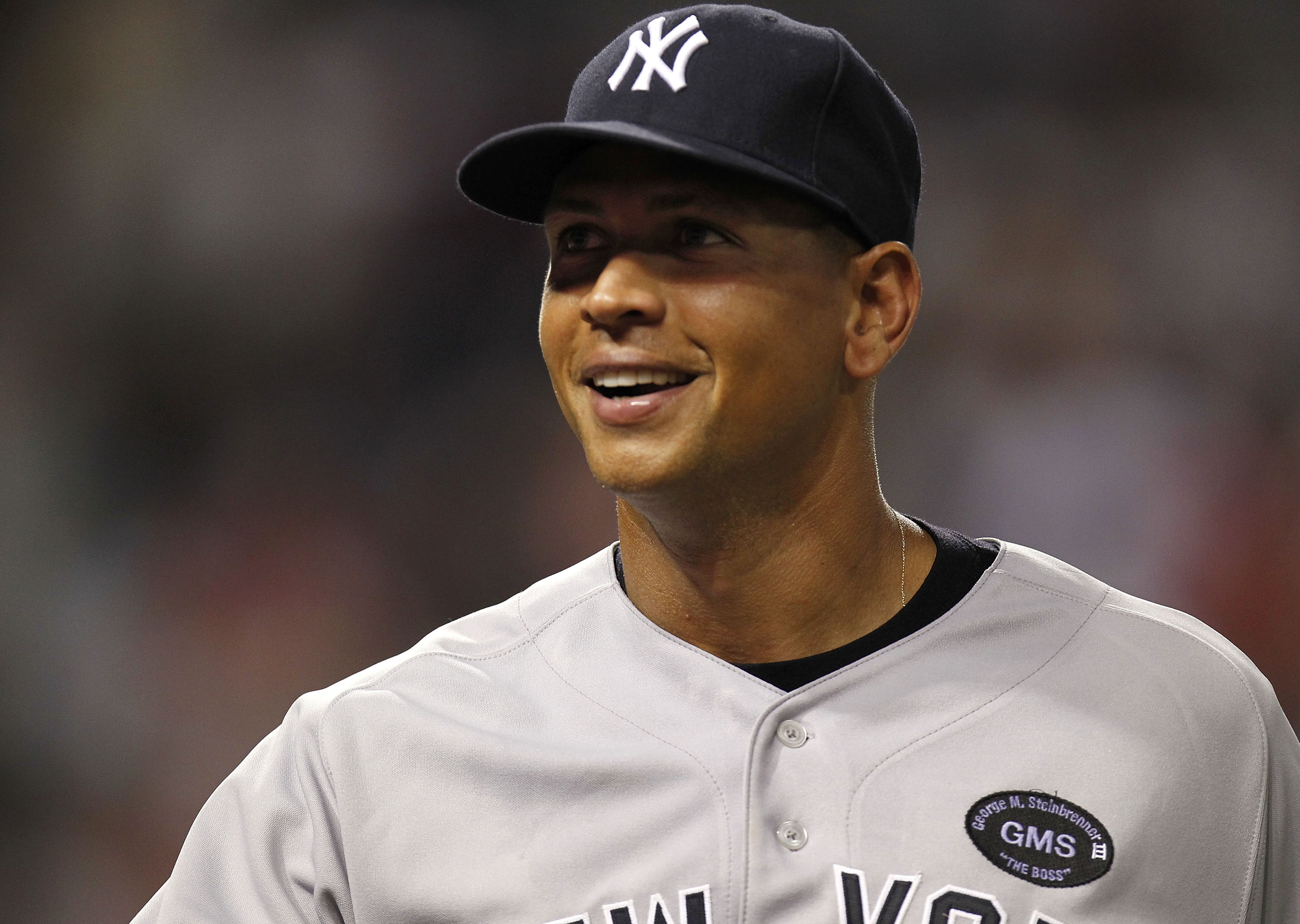 CLEVELAND - JULY 26: Alex Rodriguez #13 of the New York Yankees smiles after defeating the Cleveland Indians 3-2 on July 26, 2010 at Progressive Field in Cleveland, Ohio.  (Photo by Gregory Shamus/Getty Images)