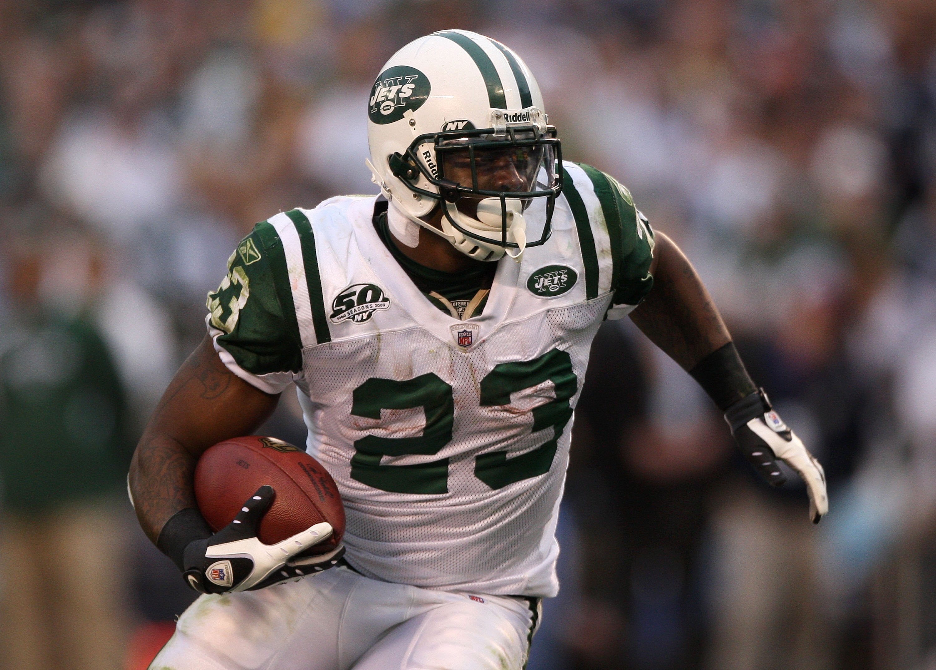 SAN DIEGO - JANUARY 17:  Running back Shonn Greene #23 of the New York Jets runs with the ball against the San Diego Chargers during the AFC Divisional Playoff Game at Qualcomm Stadium on January 17, 2010 in San Diego, California.  (Photo by Donald Mirall