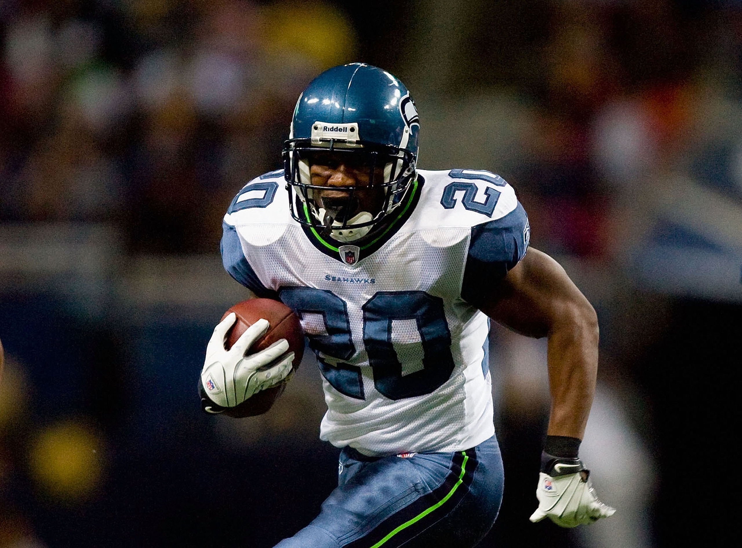 ST. LOUIS - NOVEMBER 29:  Justin Forsett #20 of the Seattle Seahawks runs with the ball for yardage against the St. Louis Rams during their NFL game at Edward Jones Dome on November 29, 2009 in St. Louis, Missouri. The Seahawks defeated the Rams 27-17.  (