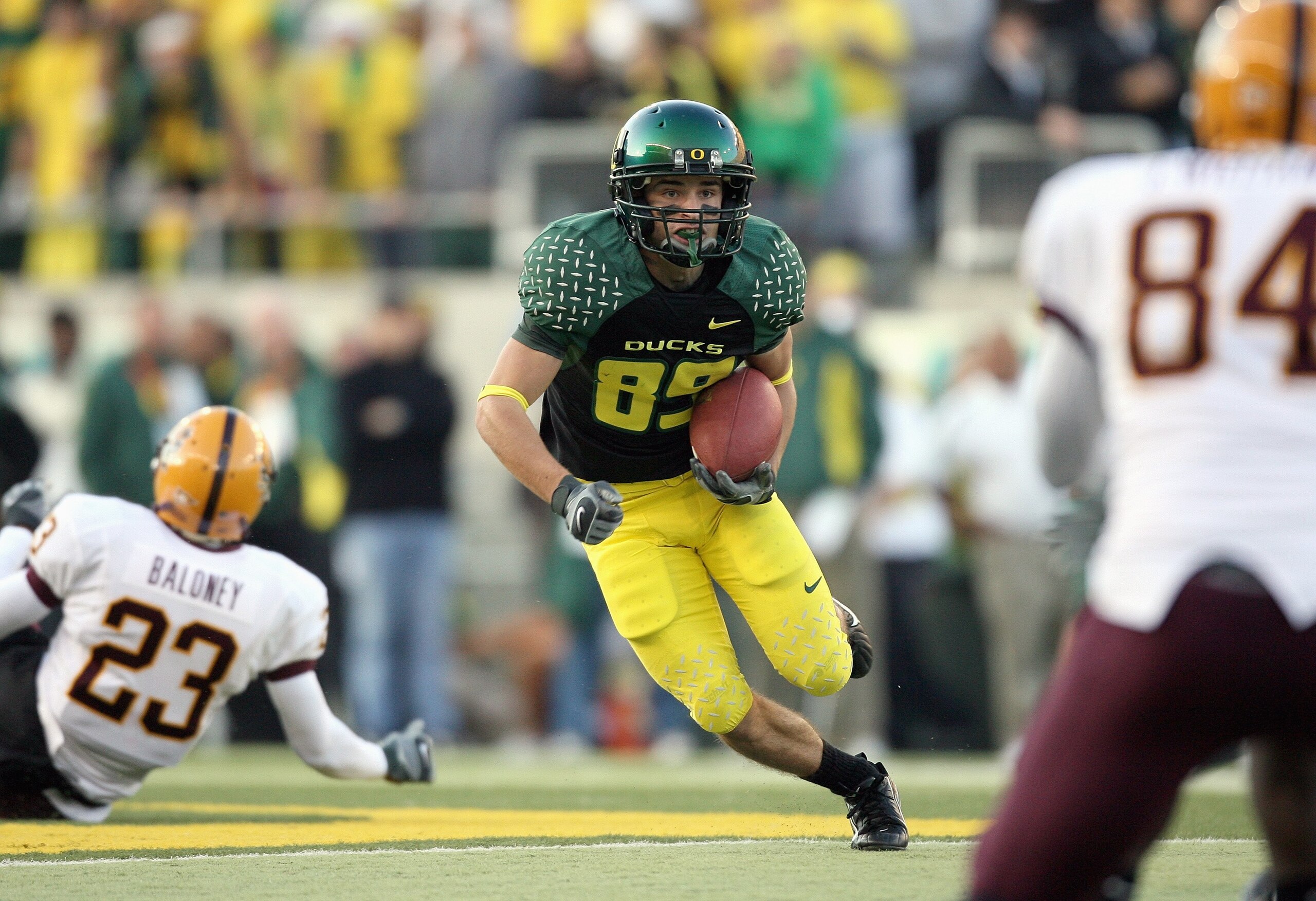 EUGENE, OR - NOVEMBER 03: Aaron Pflugrad #89 of the Oregon Ducks carries the ball during the game against the Arizona State Sun Devils at Autzen Stadium on November 3, 2007 in Eugene, Oregon. The Ducks defeated the Sun Devils 35-23. (Photo by Otto Greule EUGENE, OR - NOVEMBER 03: Aaron Pflugrad #89 of the Oregon Ducks carries the ball during the game against the Arizona State Sun Devils at Autzen Stadium on November 3, 2007 in Eugene, Oregon. The Ducks defeated the Sun Devils 35-23. (Photo by Otto Greule