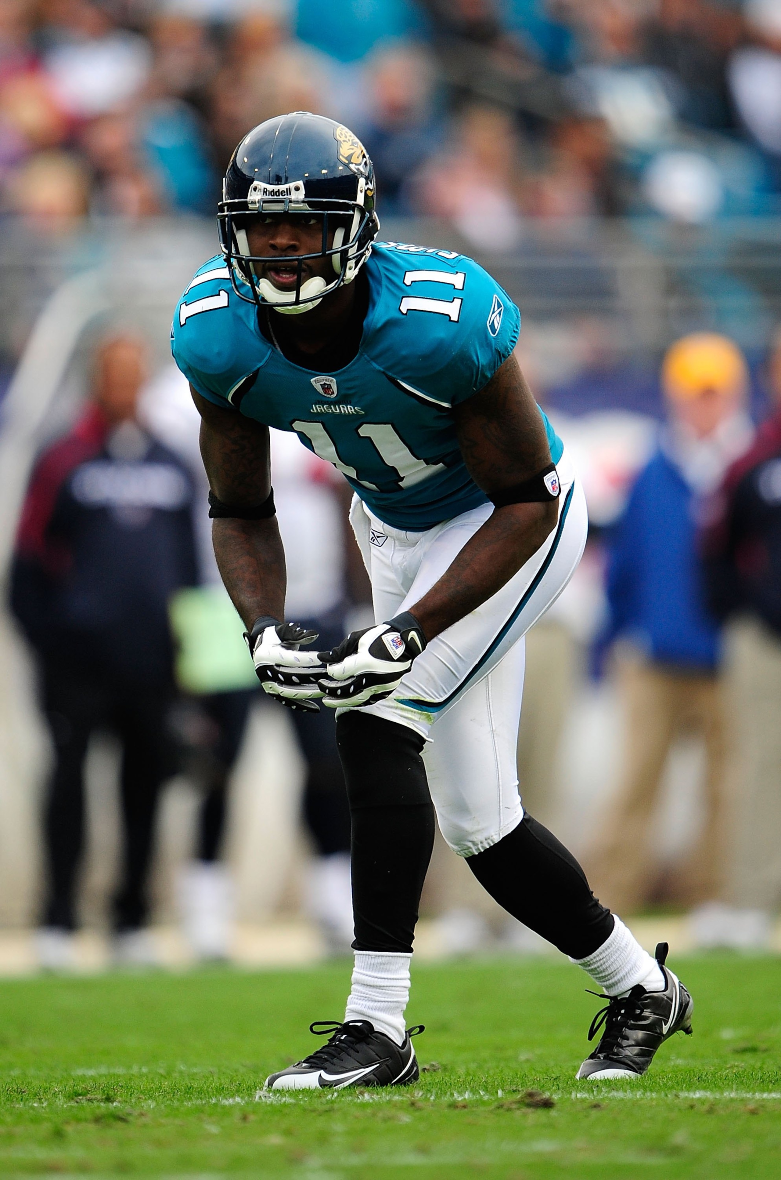 JACKSONVILLE, FL - DECEMBER 06:  Mike Sims-Walker #11 prepares to run during the game against the Houston Texans at Jacksonville Municipal Stadium on December 6, 2009 in Jacksonville, Florida.  (Photo by Sam Greenwood/Getty Images)