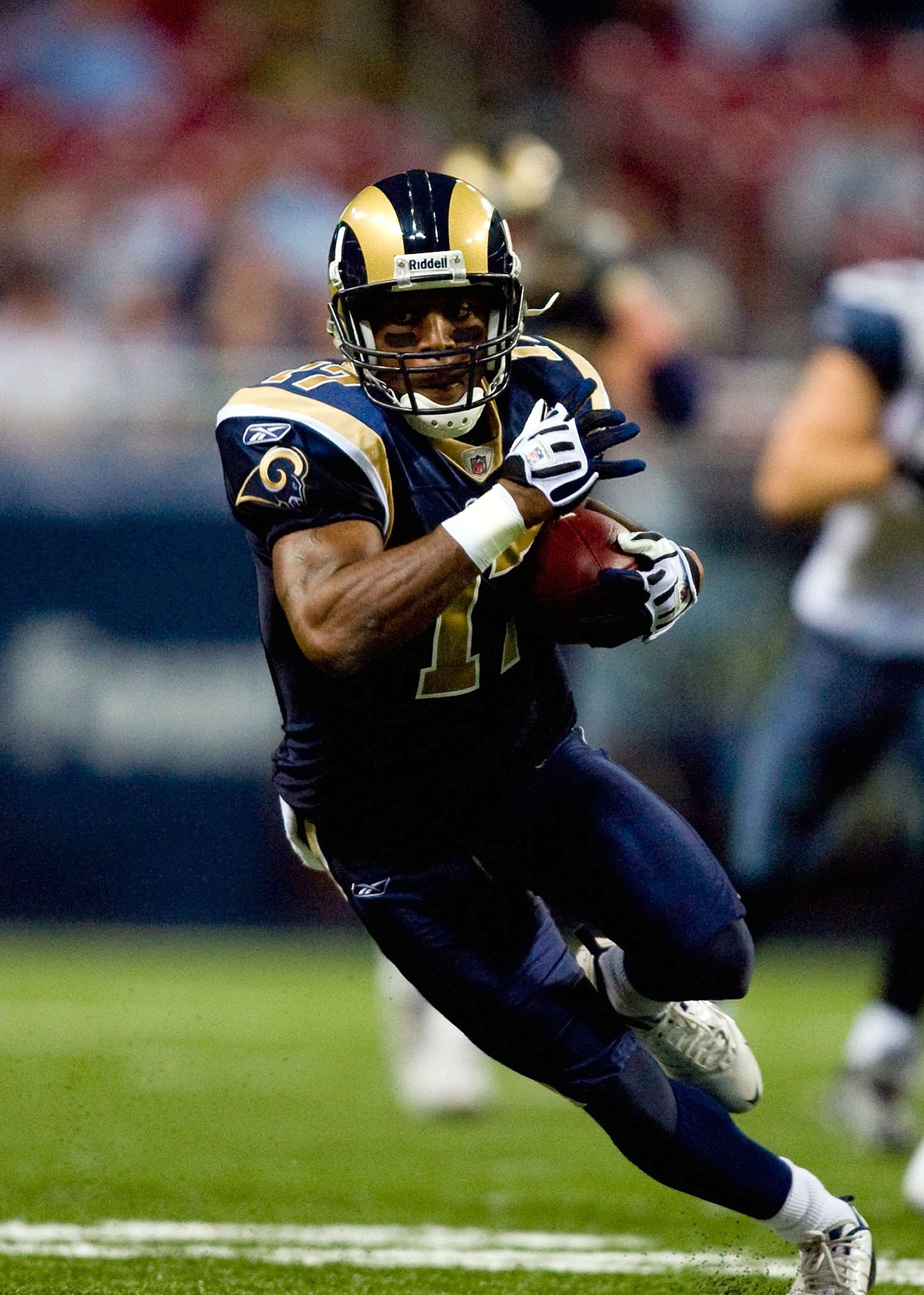 ST. LOUIS - NOVEMBER 29:  Donnie Avery #17 of the St. Louis Rams runs with the ball for yardage against the Seattle Seahawks during their NFL game at Edward Jones Dome on November 29, 2009 in St. Louis, Missouri. The Seahawks defeated the Rams 27-17.  (Ph