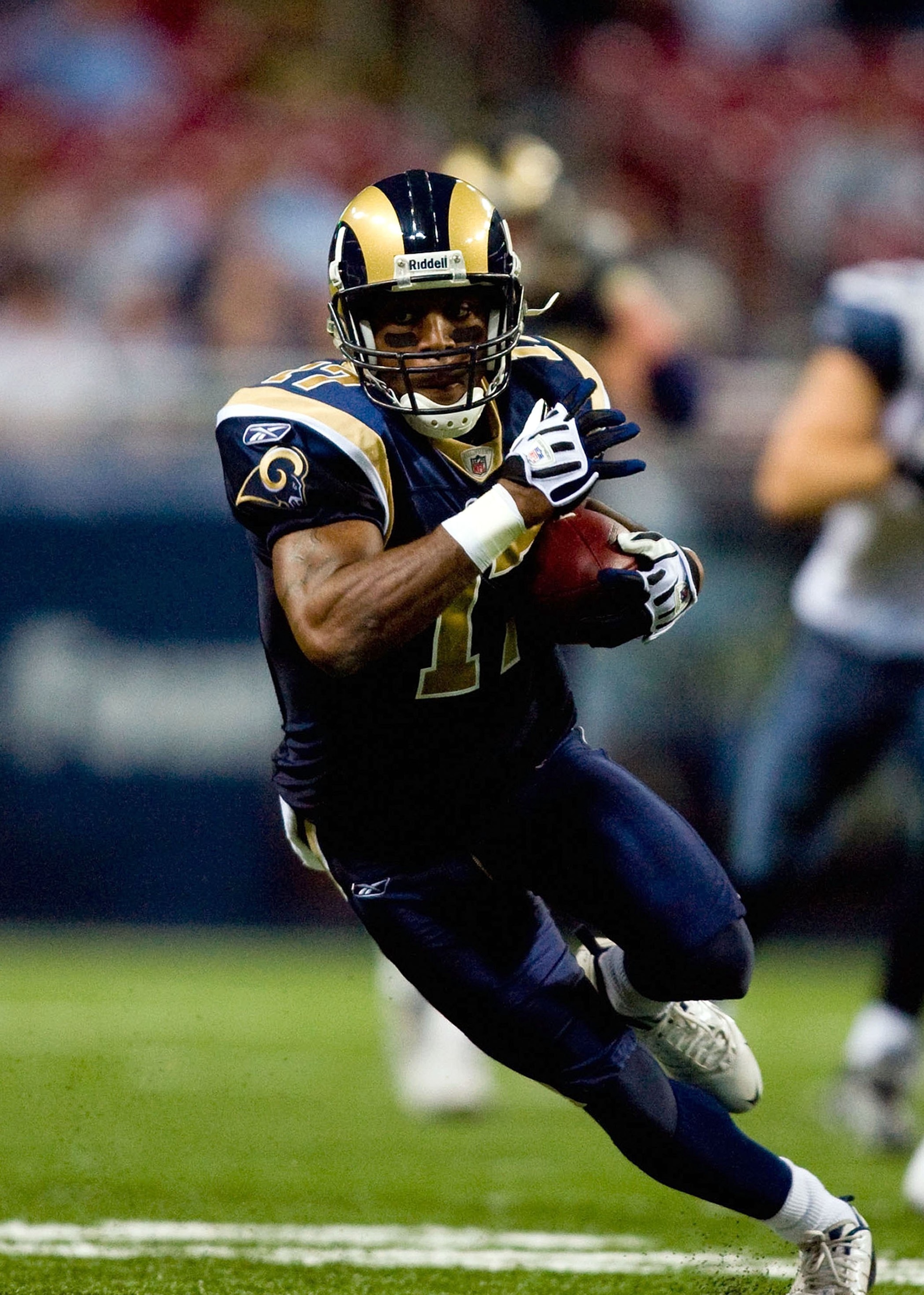 ST. LOUIS - NOVEMBER 29:  Donnie Avery #17 of the St. Louis Rams runs with the ball for yardage against the Seattle Seahawks during their NFL game at Edward Jones Dome on November 29, 2009 in St. Louis, Missouri. The Seahawks defeated the Rams 27-17.  (Ph