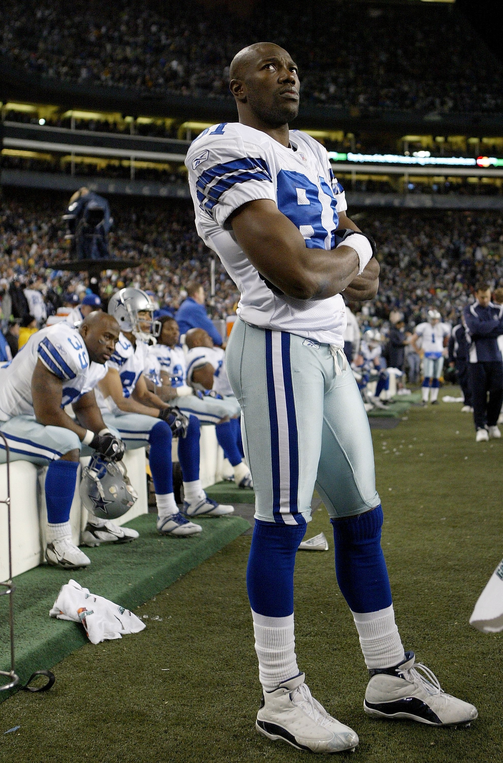 SEATTLE - JANUARY 06:  Terrell Owens #81 of the Dallas Cowboys stands dejected in the final minutes of the fourth quarter of the NFC Wild Card Playoff Game against the Seattle Seahawks on January 6, 2007 at Qwest Field in Seattle, Washington. The Seattle 
