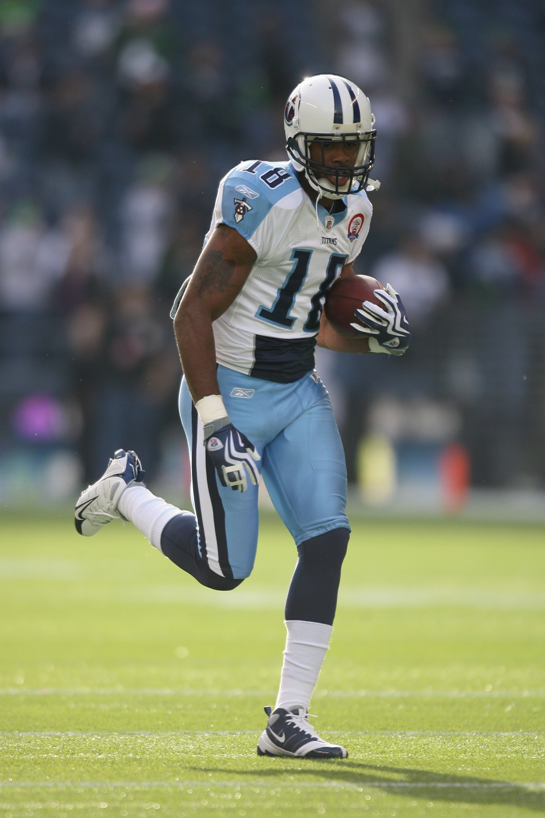 SEATTLE - JANUARY 03:  Kenny Britt #18 of the Tennessee Titans warms up before the game against the Seattle Seahawks on January 3, 2010 at Qwest Field in Seattle, Washington. (Photo by Otto Greule Jr/Getty Images)