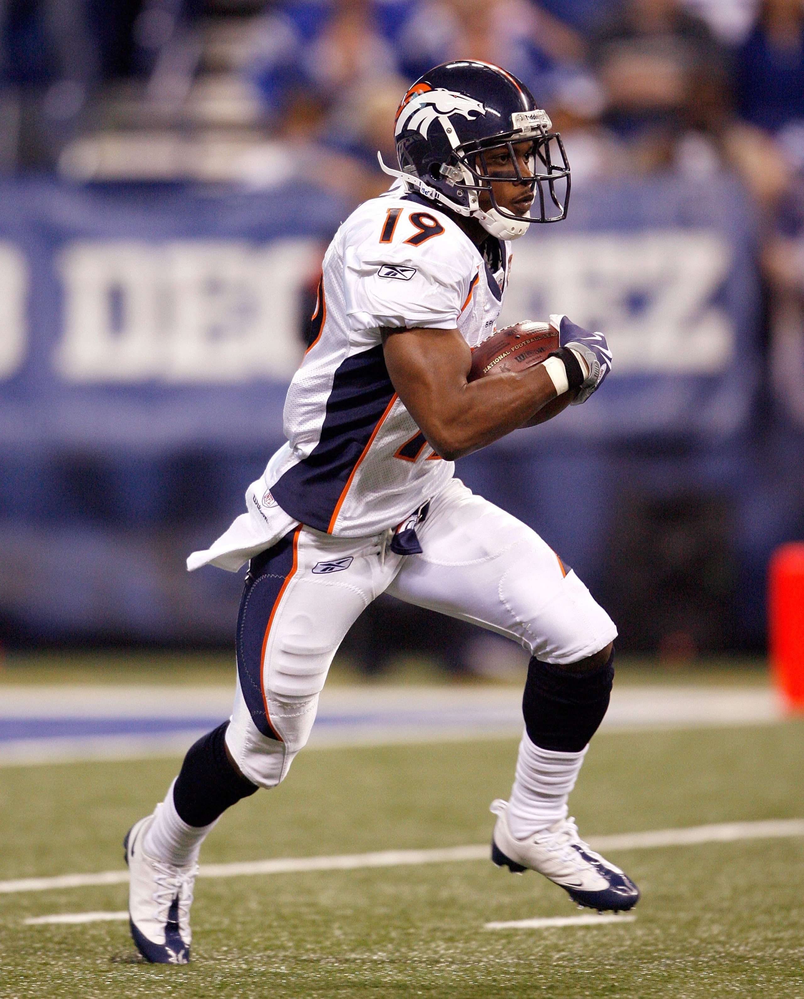 INDIANAPOLIS - DECEMBER 13:  Eddie Royal #19 of the Denver Broncos carries the ball during the NFL game against the Indianapolis Colts at Lucas Oil Stadium on December 13, 2009 in Indianapolis, Indiana.  The Colts won 28-16.  (Photo by Andy Lyons/Getty Im